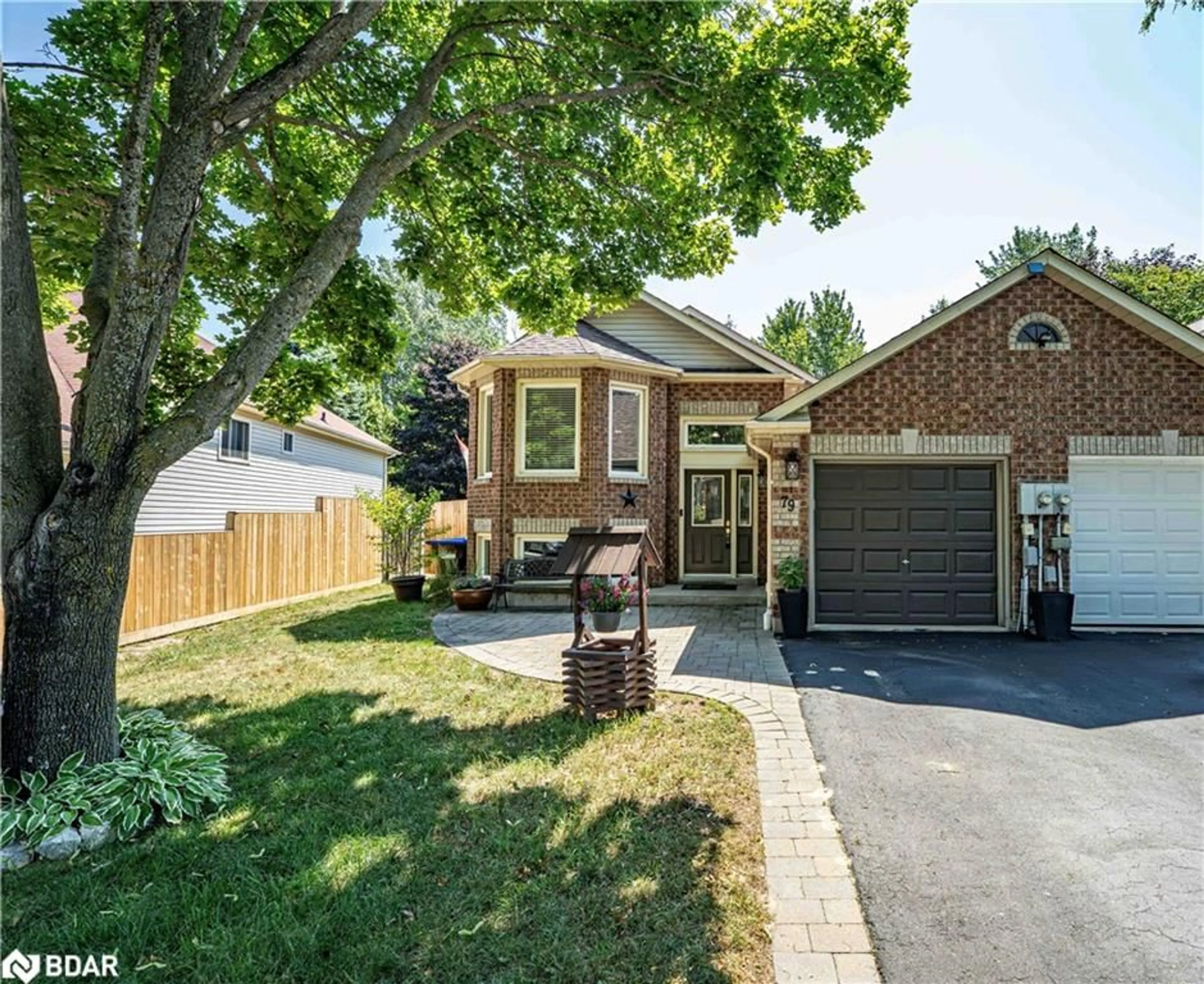 Home with brick exterior material, street for 79 Dyer Dr, Wasaga Beach Ontario L9Z 1E4