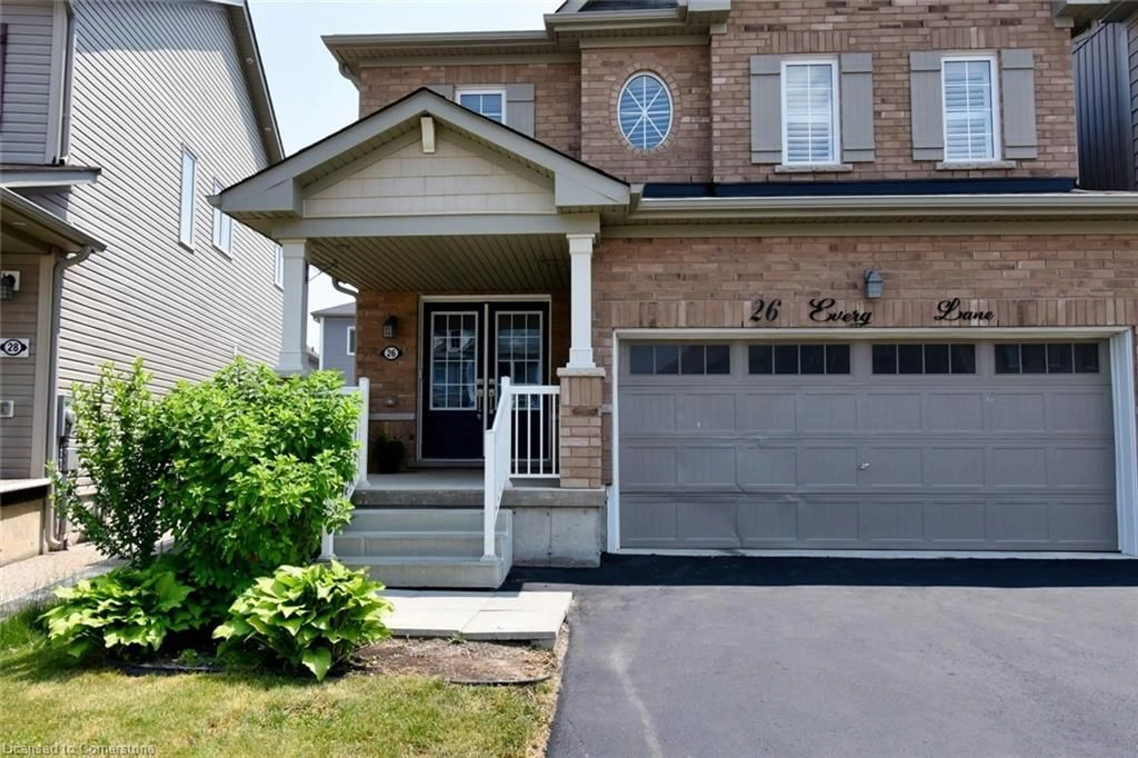 Home with brick exterior material, street for 26 Evergreen Lane, Caledonia Ontario N3W 0C4