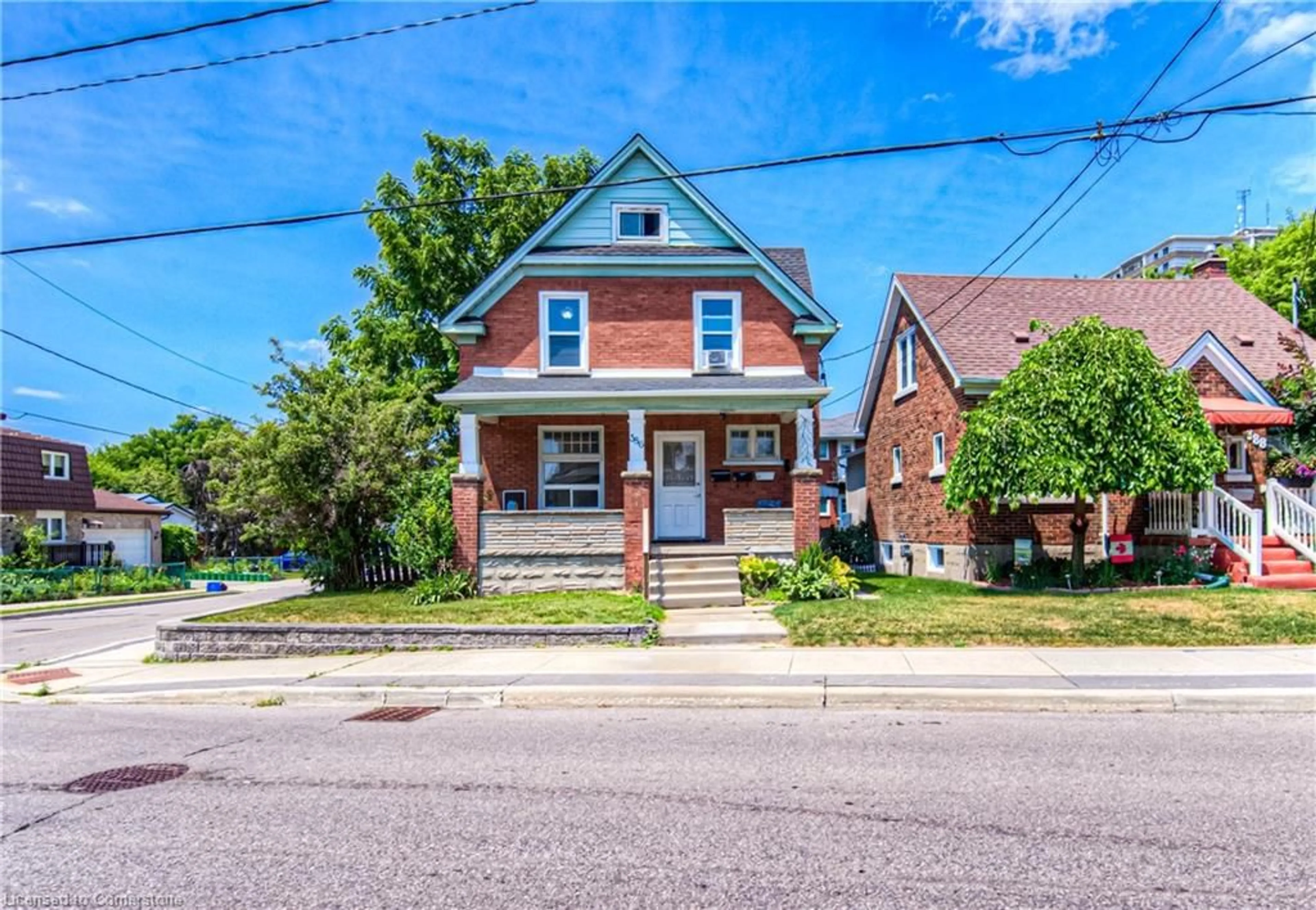 Home with brick exterior material, street for 386 Guelph St, Kitchener Ontario N2H 5X7