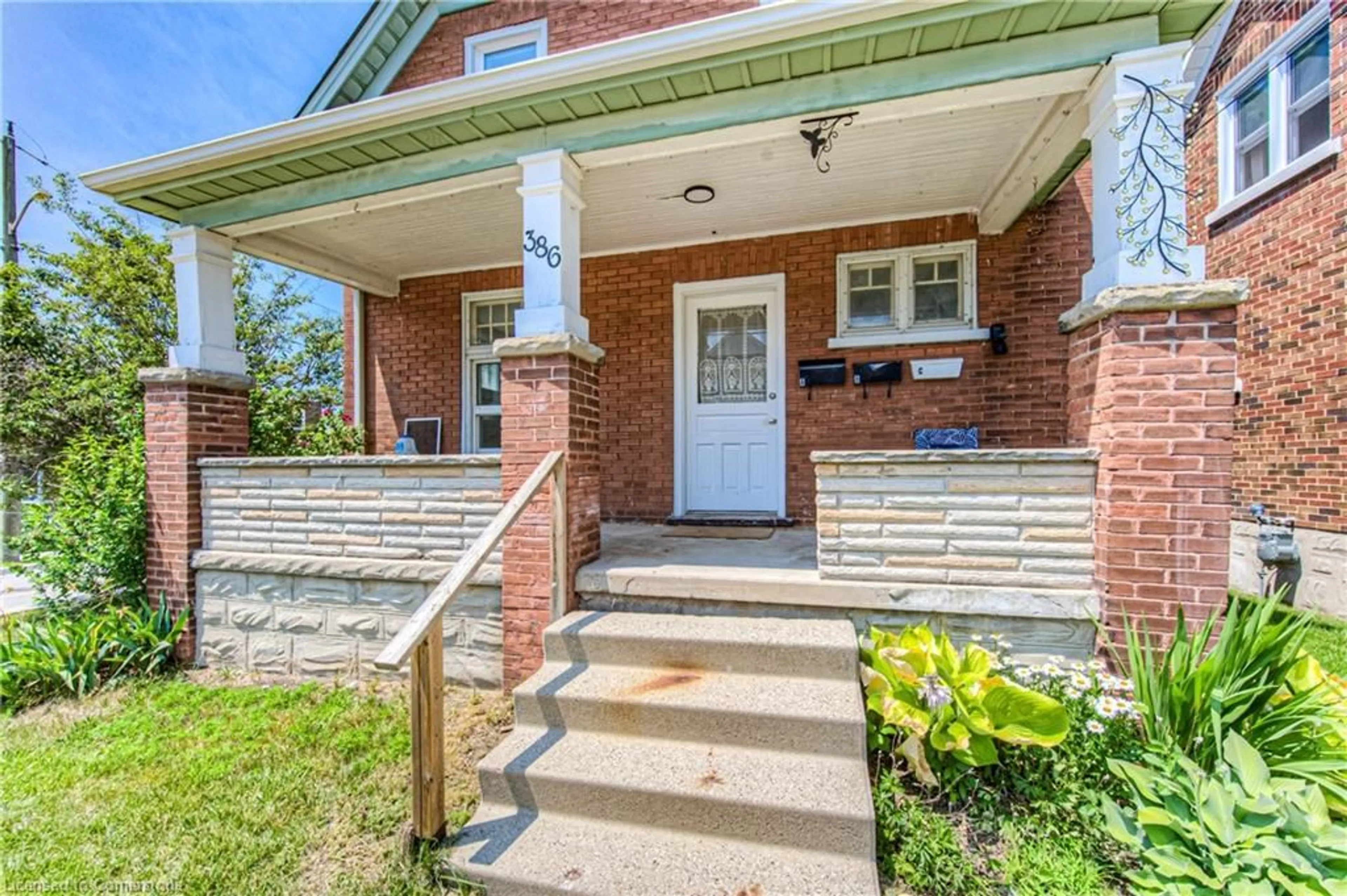 Home with brick exterior material, street for 386 Guelph St, Kitchener Ontario N2H 5X7