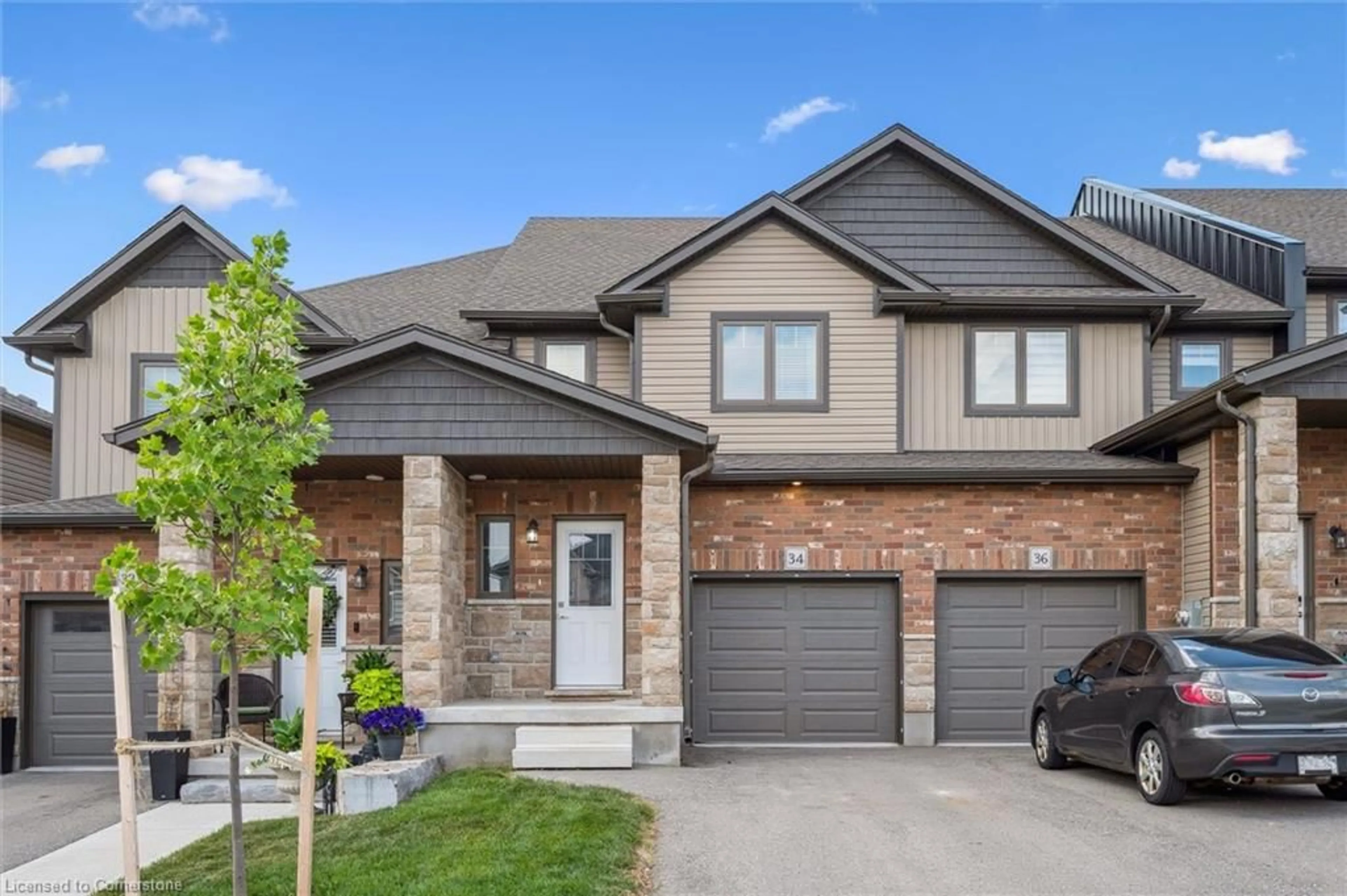 Home with brick exterior material, street for 34 Wideman Blvd, Guelph Ontario N1E 7L8