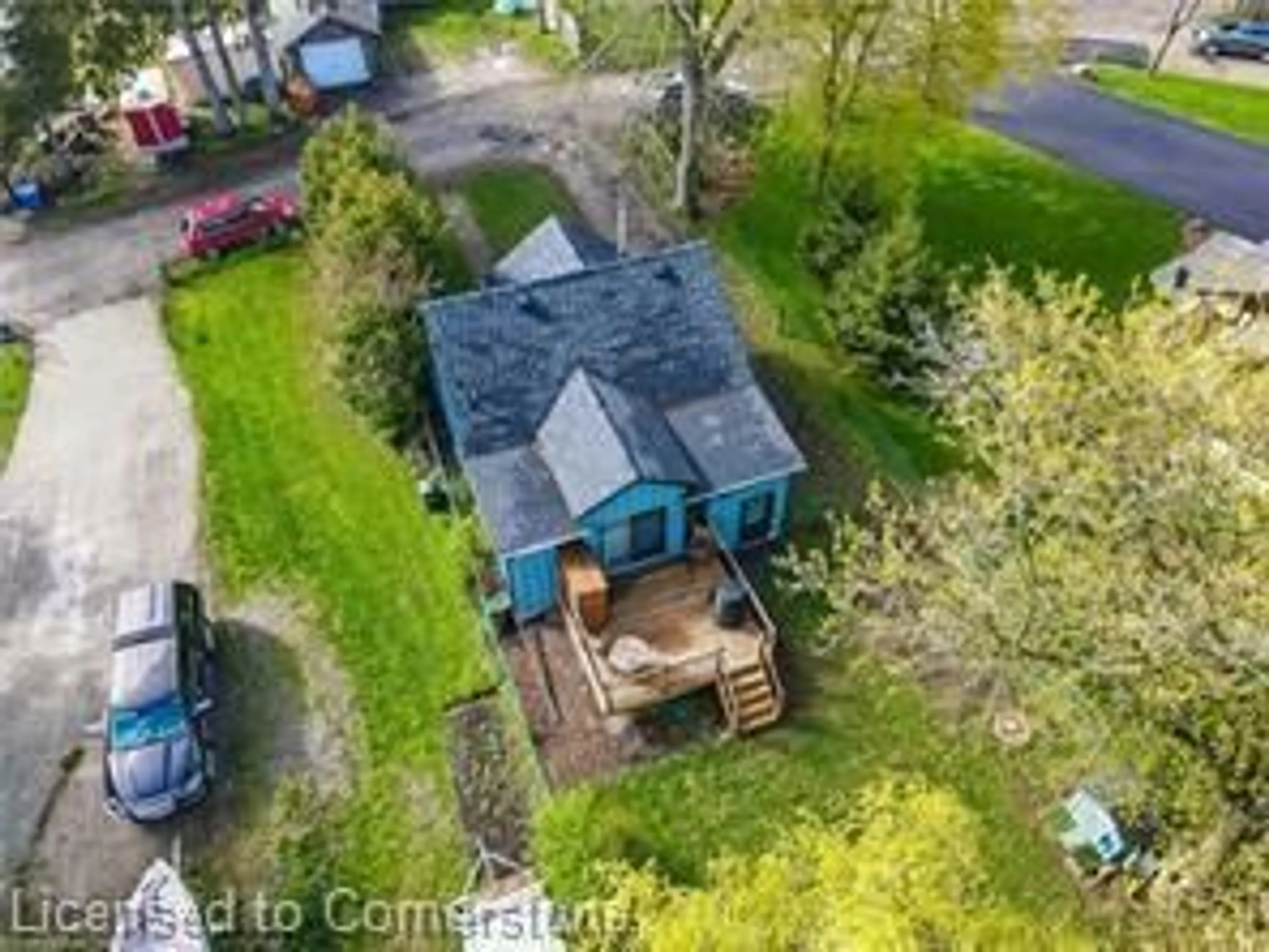 A pic from outside/outdoor area/front of a property/back of a property/a pic from drone, street for 16 Maple Trail, Puslinch Ontario N3C 2V4