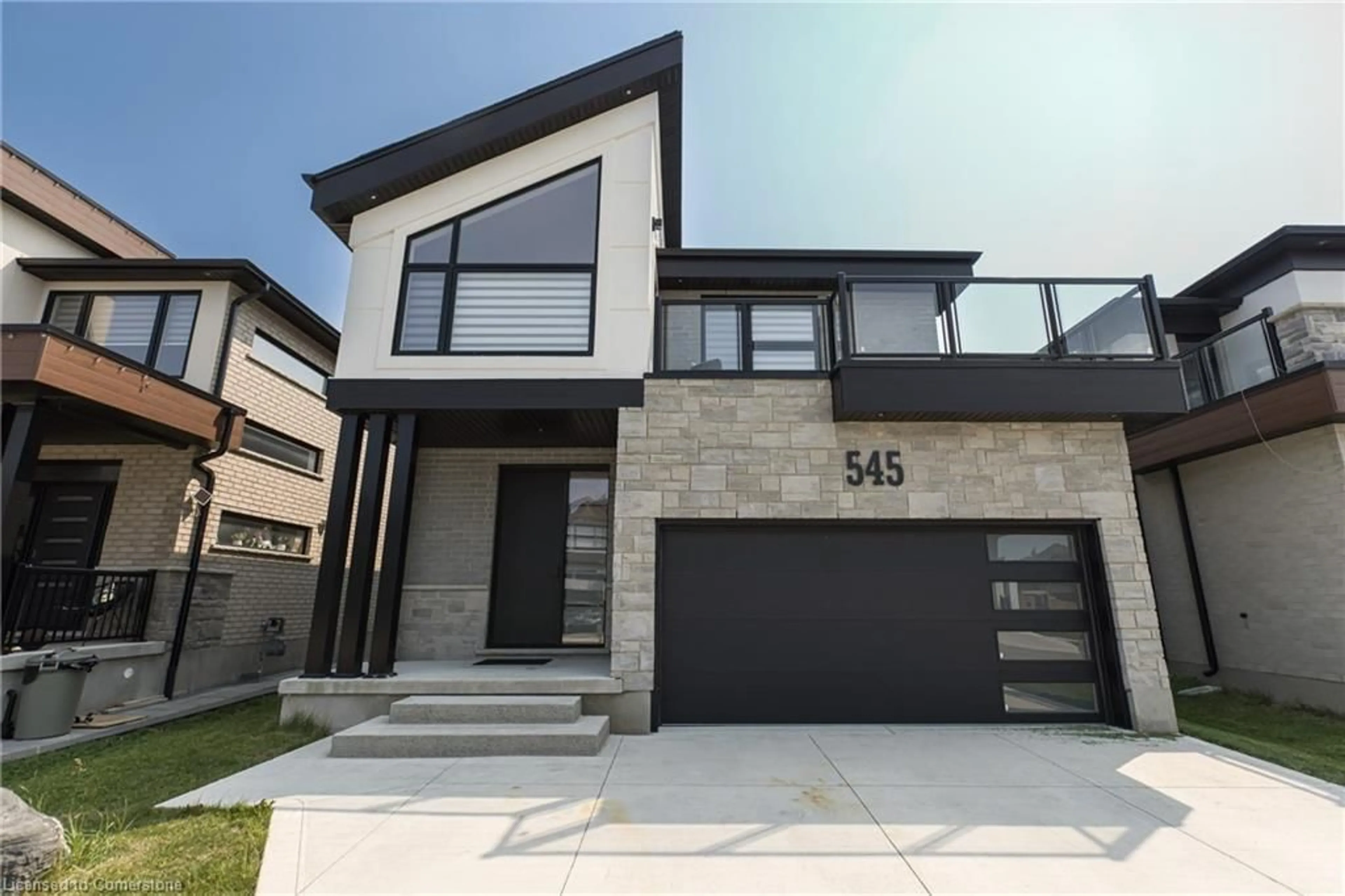 Home with brick exterior material, street for 545 Doonwoods Cres, Kitchener Ontario N2P 0E5