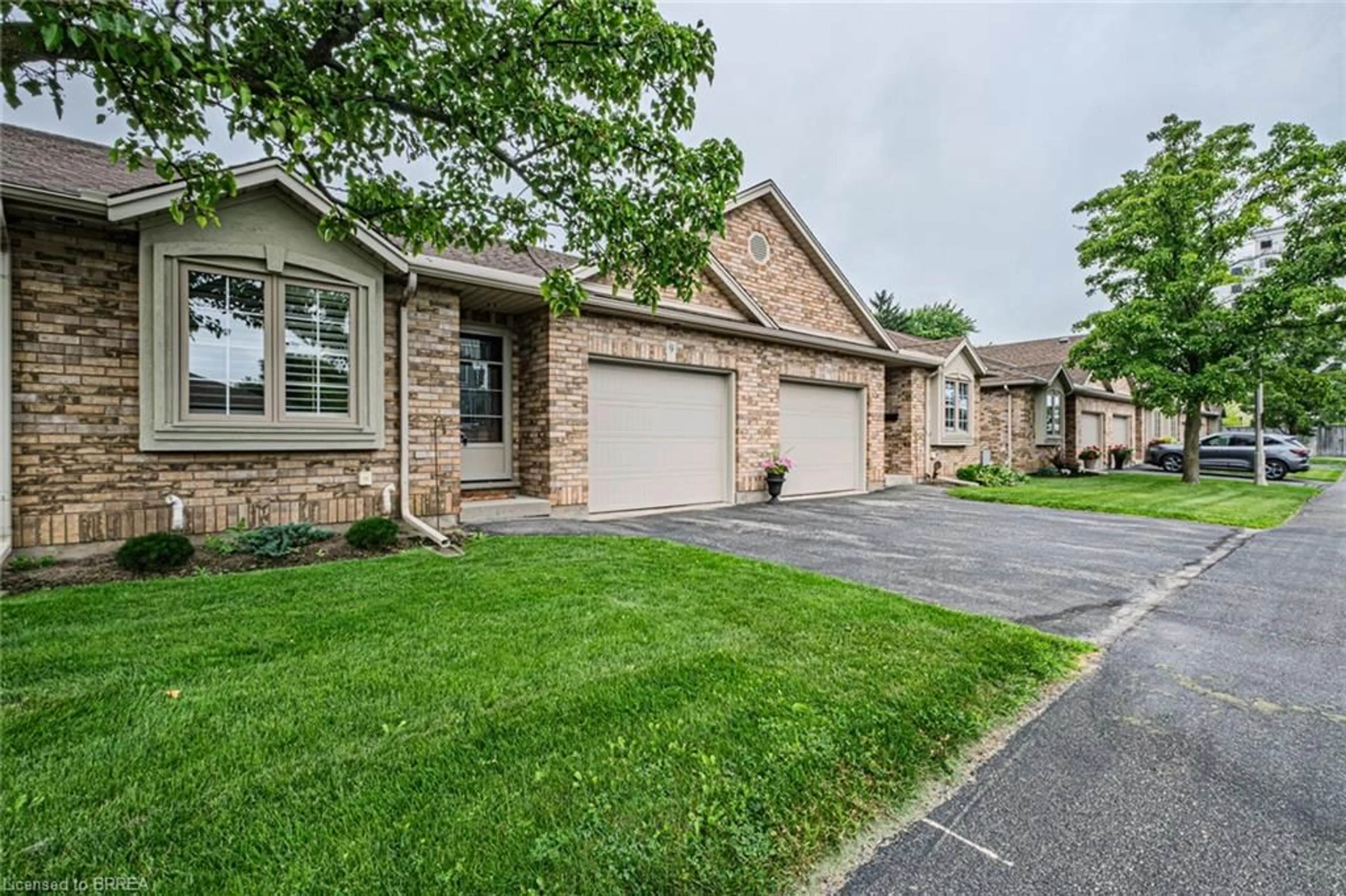 Home with brick exterior material, street for 110 Somerset Rd #9, Brantford Ontario N3R 5A8