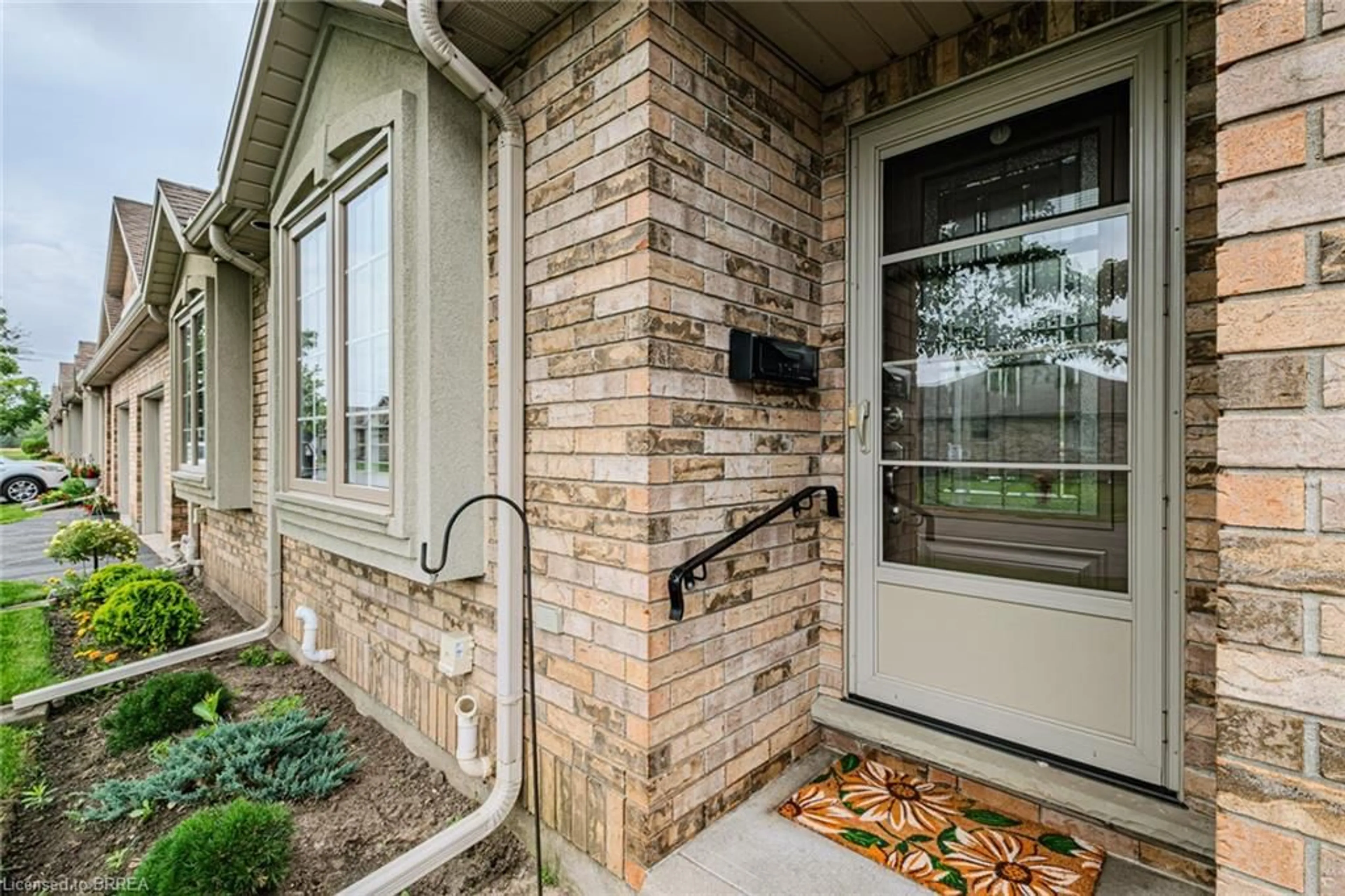Home with brick exterior material, street for 110 Somerset Rd #9, Brantford Ontario N3R 5A8