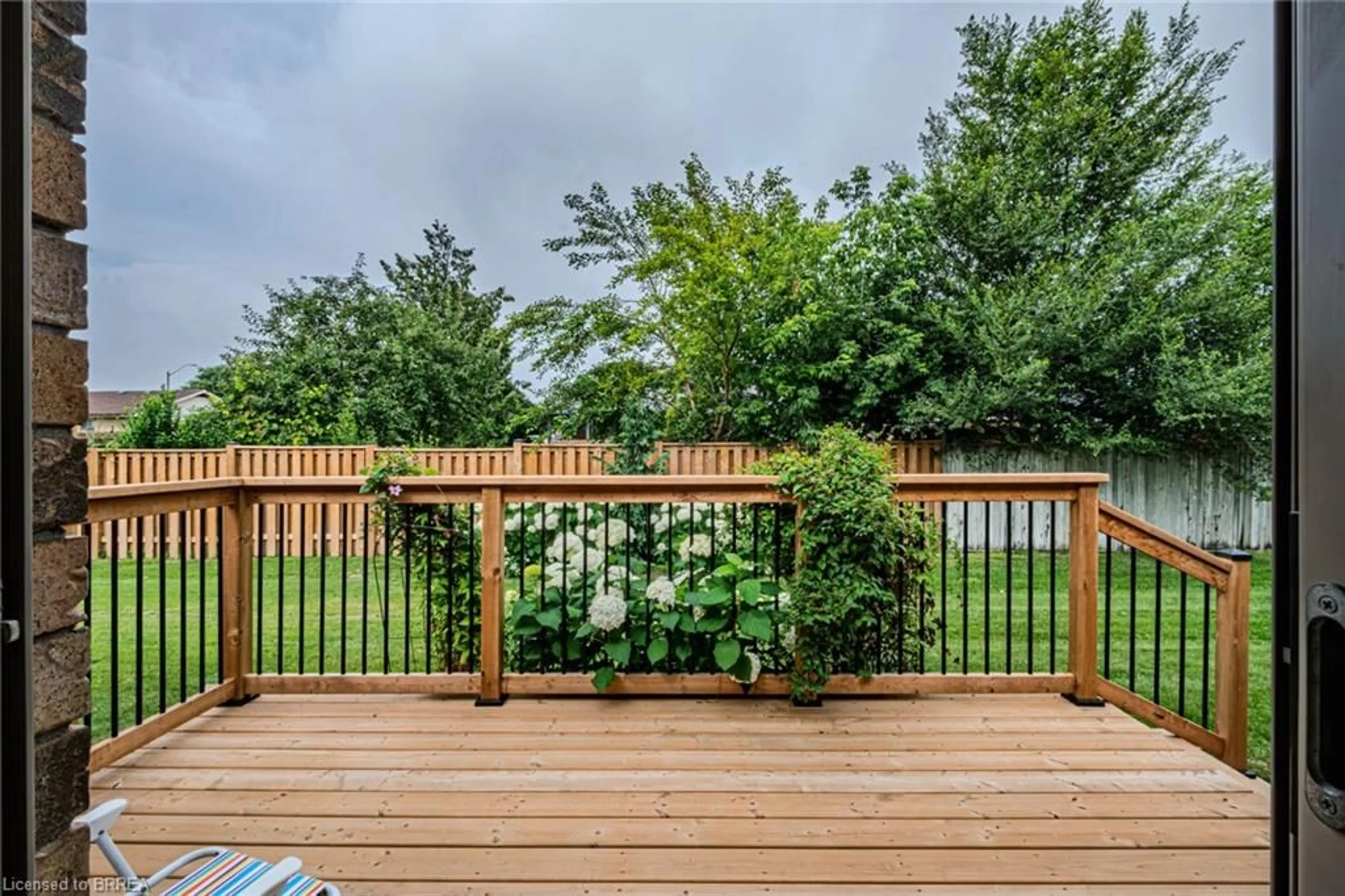 Patio, forest/trees view for 110 Somerset Rd #9, Brantford Ontario N3R 5A8