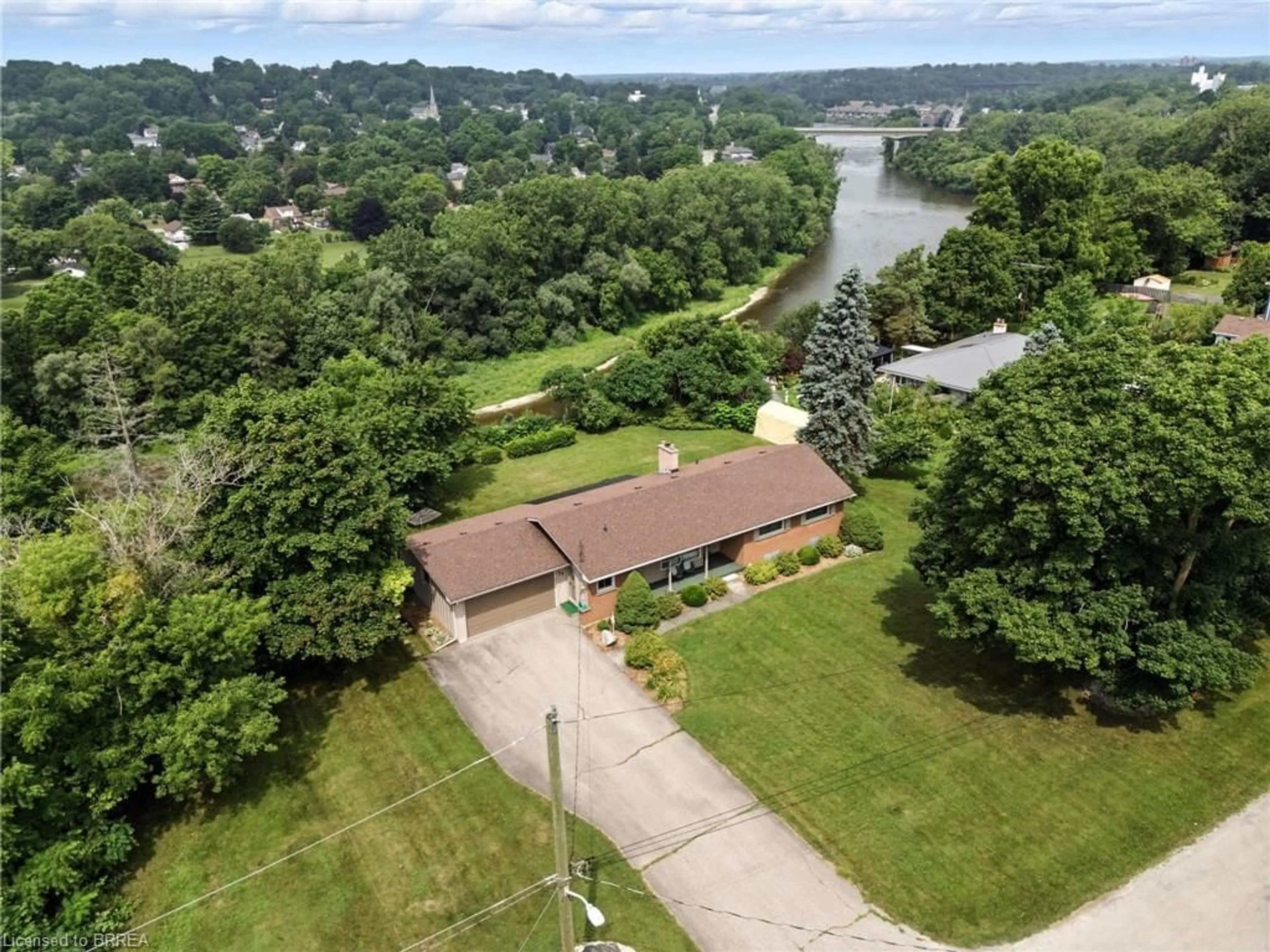 A pic from outside/outdoor area/front of a property/back of a property/a pic from drone, water/lake/river/ocean view for 74 Curtis Ave, Paris Ontario N3L 3J7