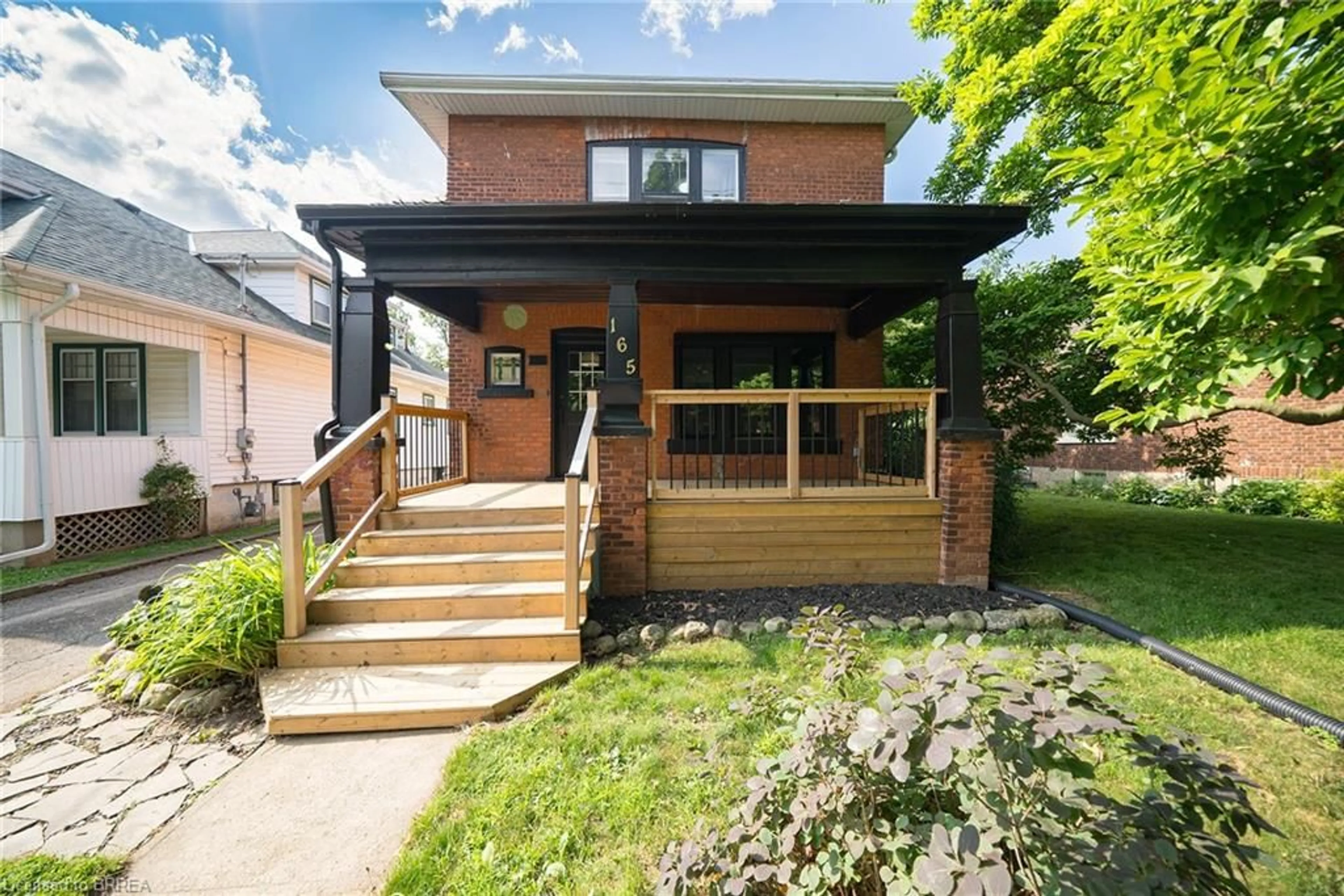 Home with brick exterior material, street for 165 East Ave, Brantford Ontario N3S 3M5