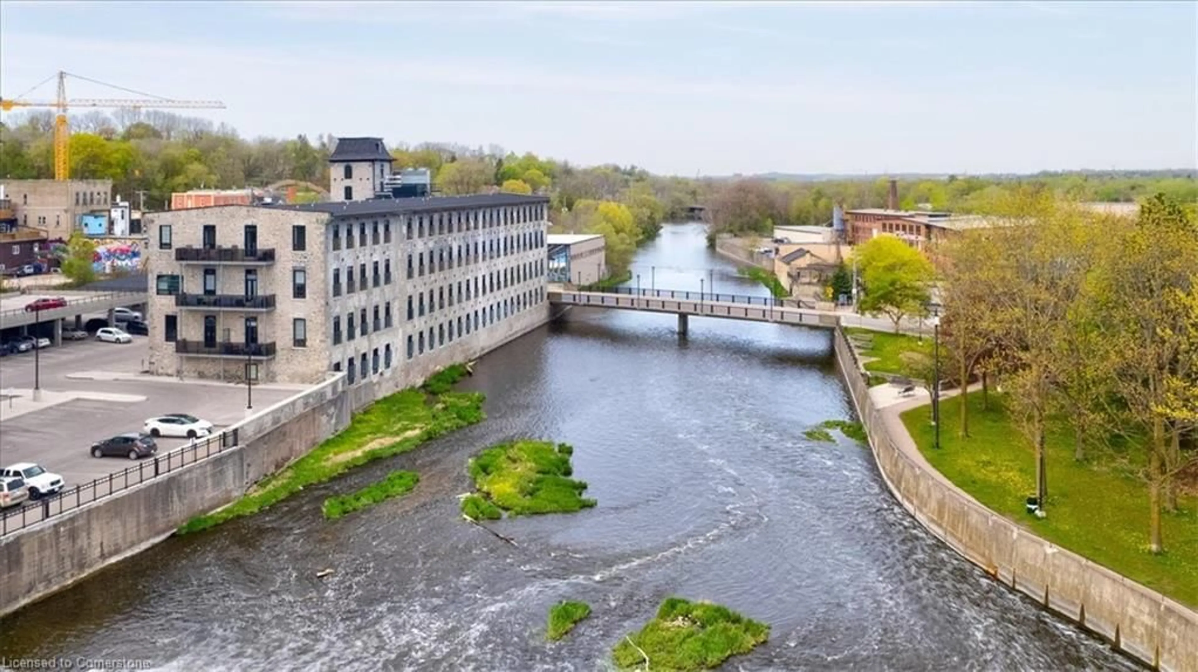 A pic from outside/outdoor area/front of a property/back of a property/a pic from drone, water/lake/river/ocean view for 19 Guelph Ave #107, Cambridge Ontario N3C 1A2