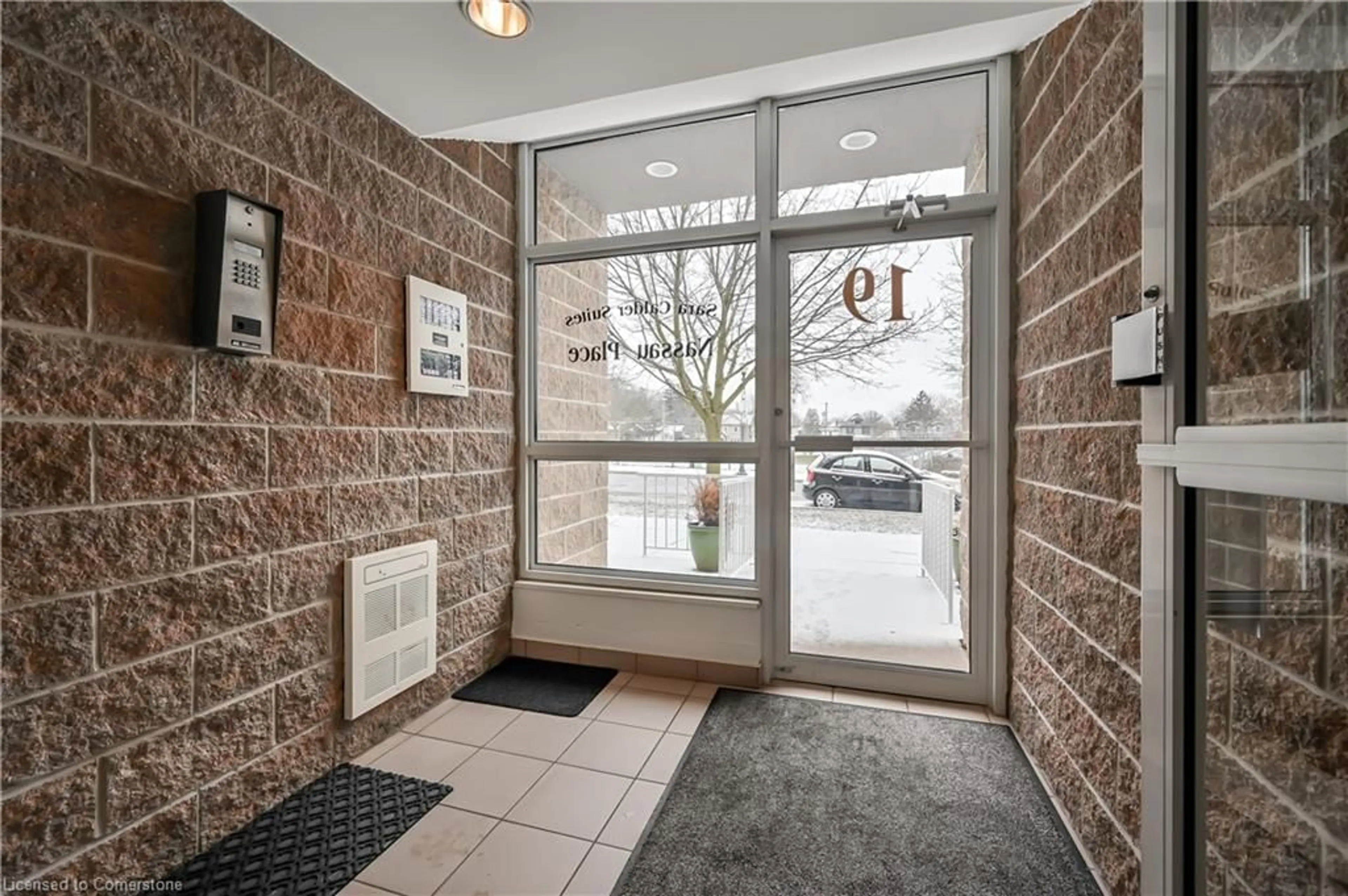 Indoor foyer for 19 Lake Ave #102, Stoney Creek Ontario L8G 2V1