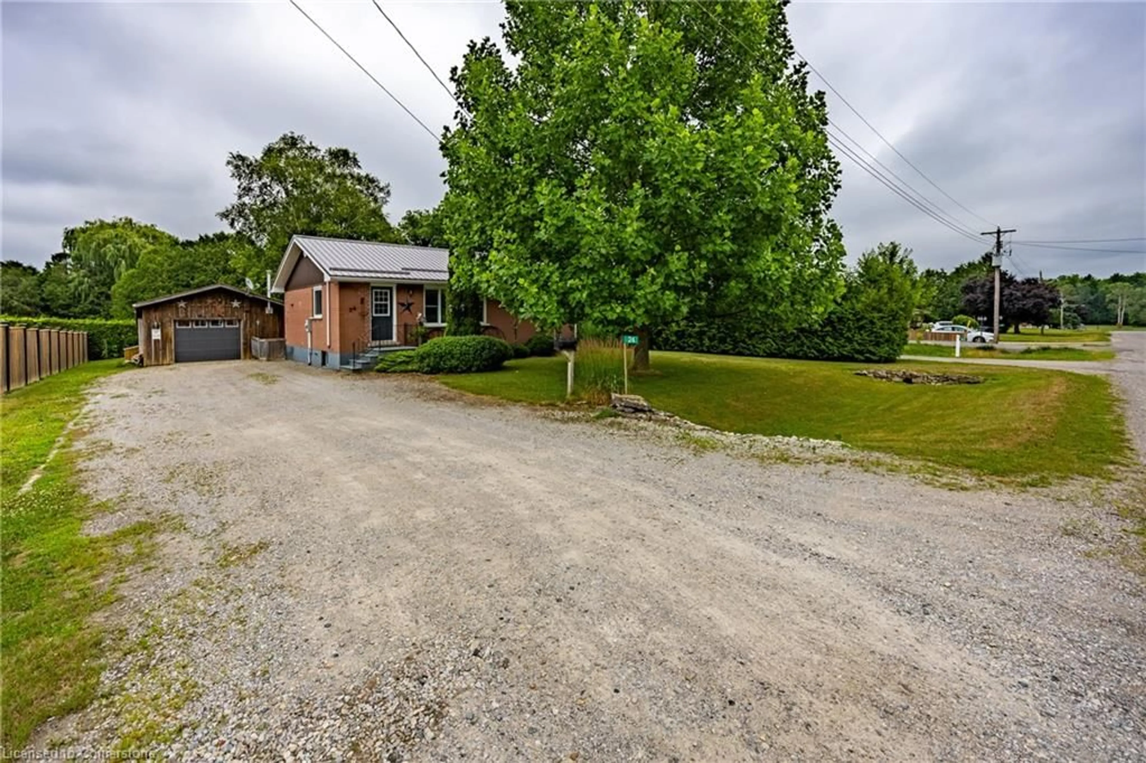 A pic from outside/outdoor area/front of a property/back of a property/a pic from drone, street for 24 Henry St, Delhi Ontario N4B 2G1