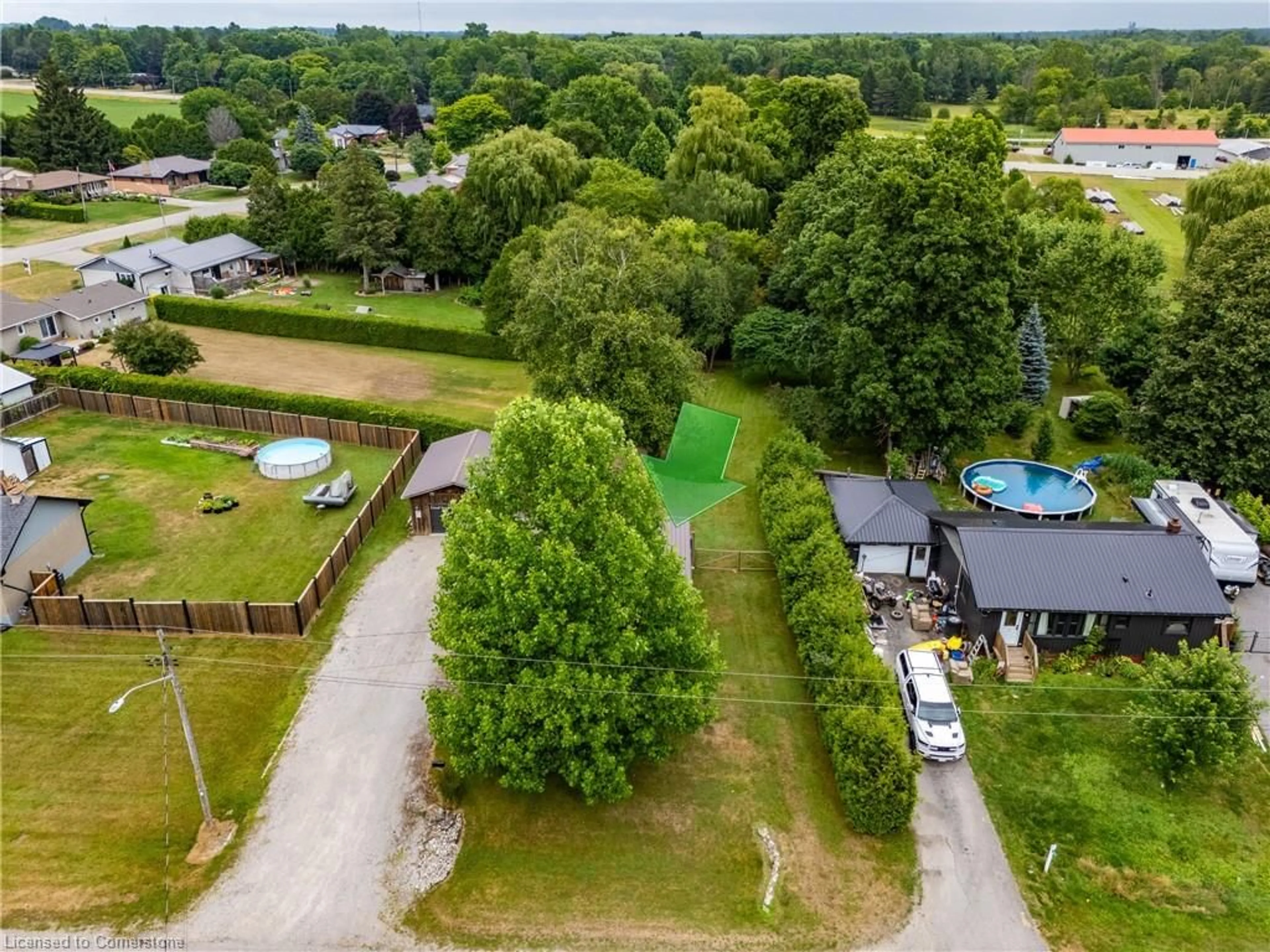 A pic from outside/outdoor area/front of a property/back of a property/a pic from drone, water/lake/river/ocean view for 24 Henry St, Delhi Ontario N4B 2G1
