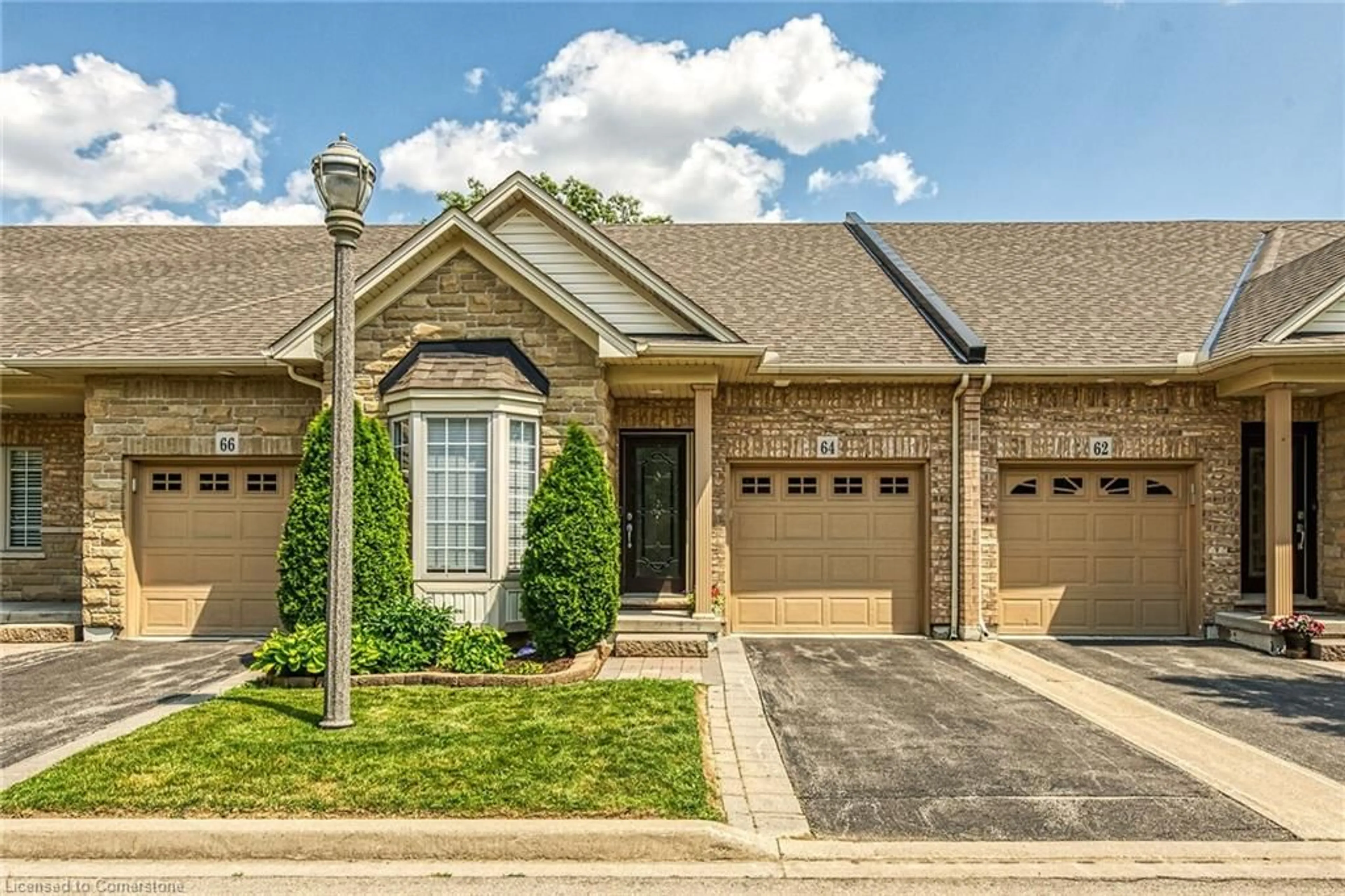 Home with brick exterior material, street for 64 Oakhampton Trail, Glanbrook Ontario L9B 0B8