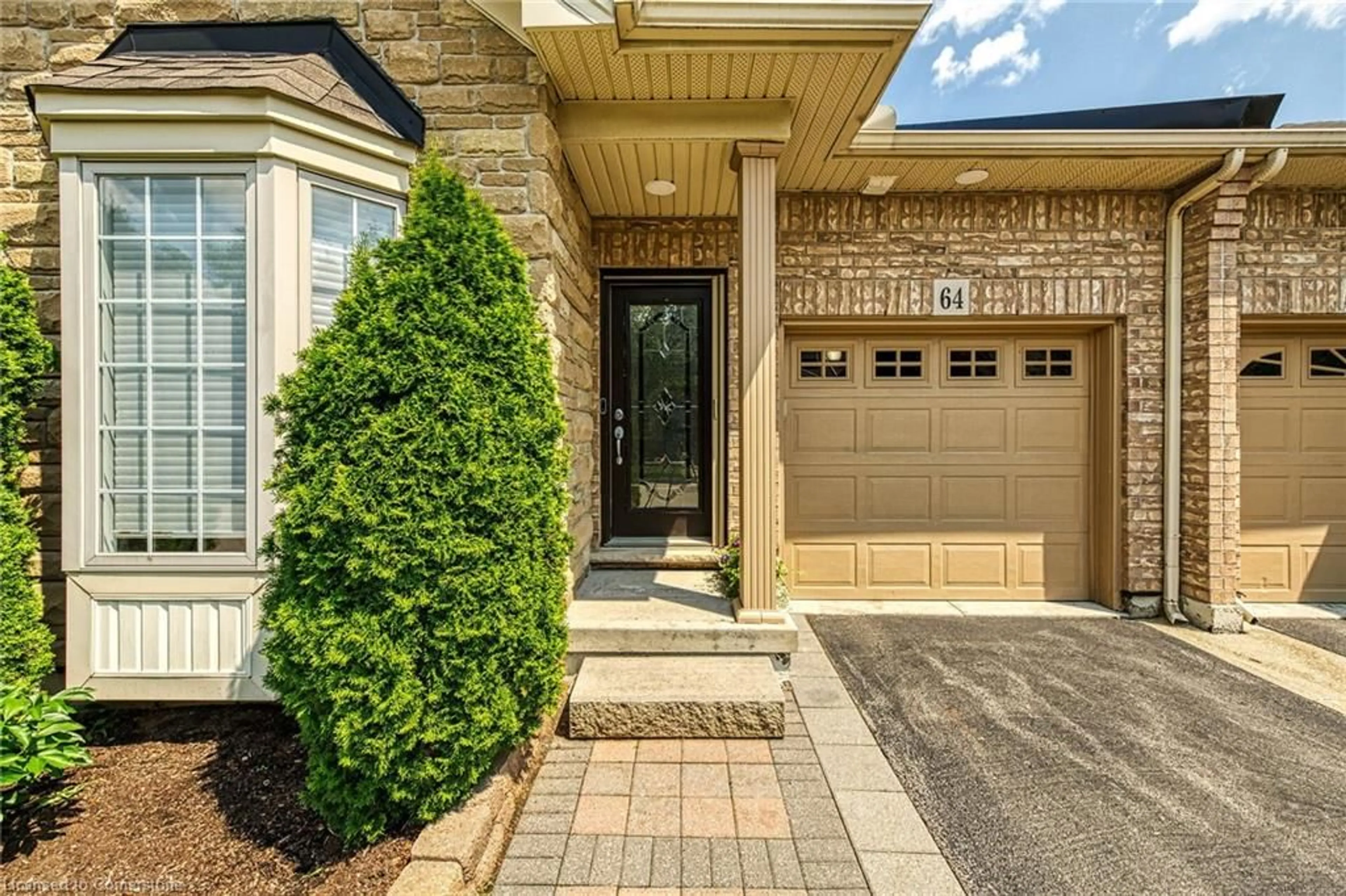 Home with brick exterior material, street for 64 Oakhampton Trail, Glanbrook Ontario L9B 0B8