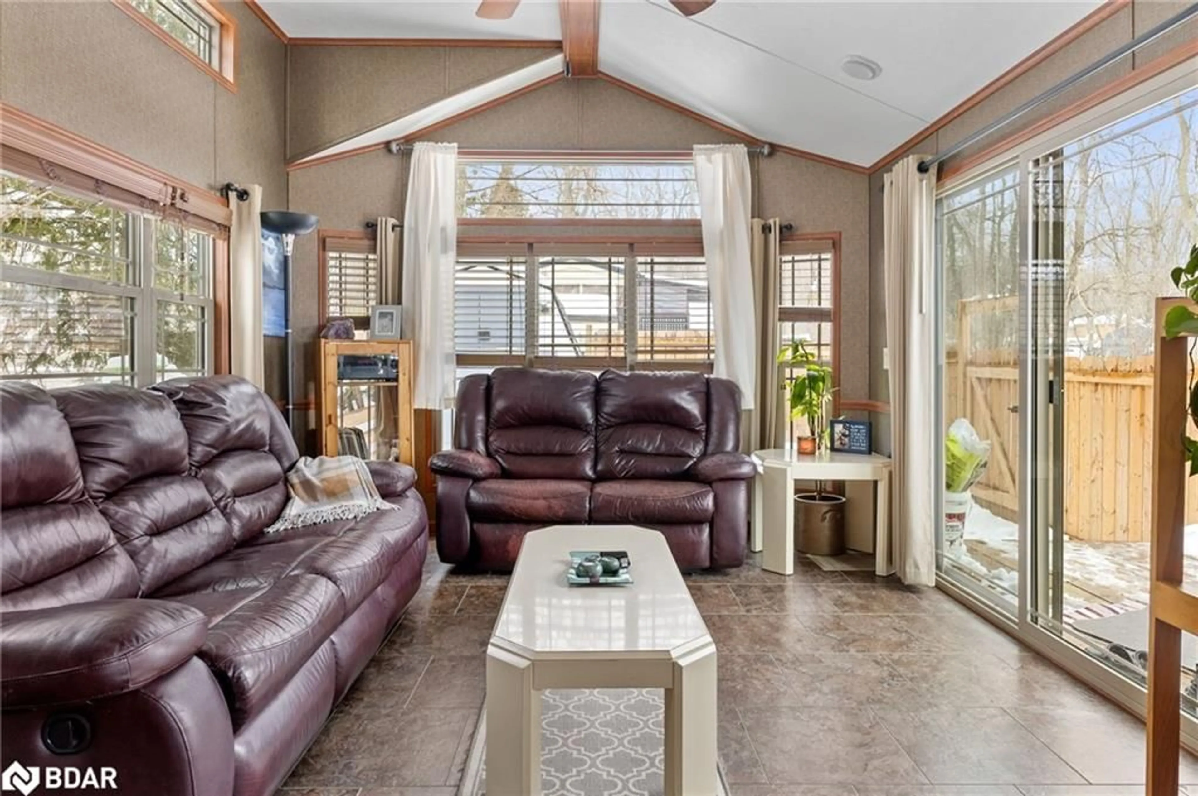 Living room with furniture, ceramic/tile floor for 5139 Halstead Beach Rd, Bewdley Ontario K0L 1E0