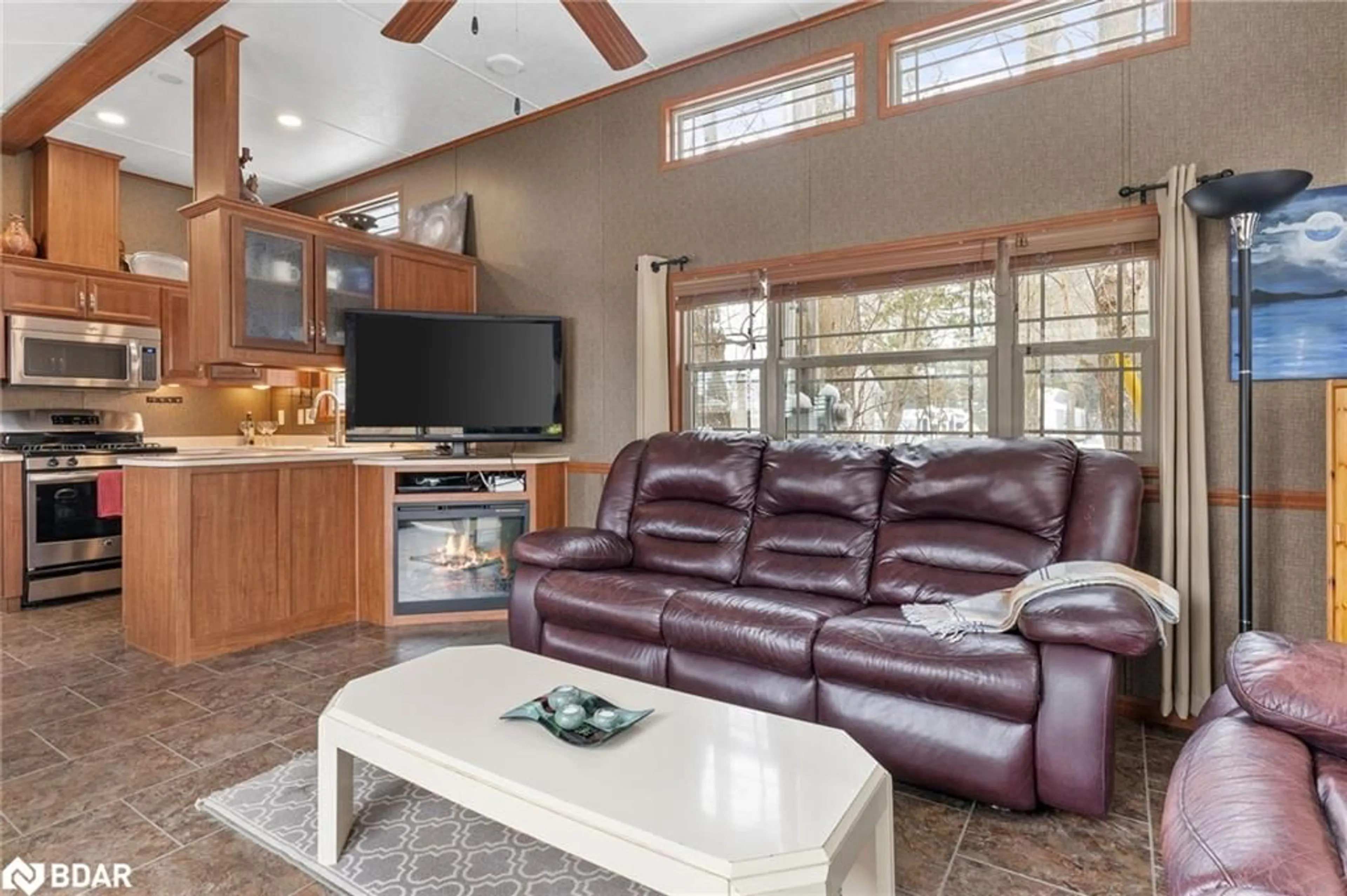 Living room with furniture, unknown for 5139 Halstead Beach Rd, Bewdley Ontario K0L 1E0