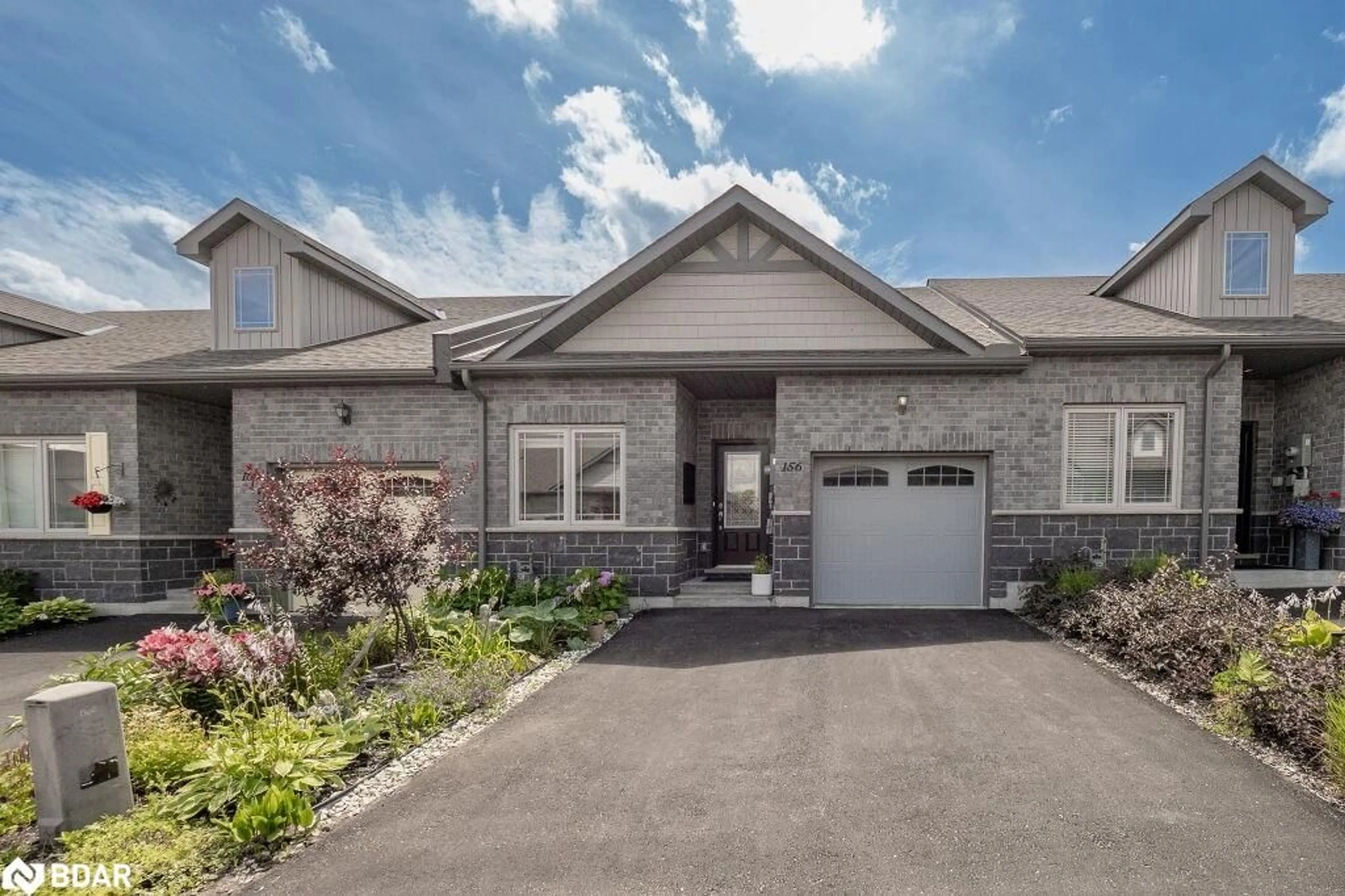Home with brick exterior material, street for 156 Lily Dr, Orillia Ontario L3V 0G3