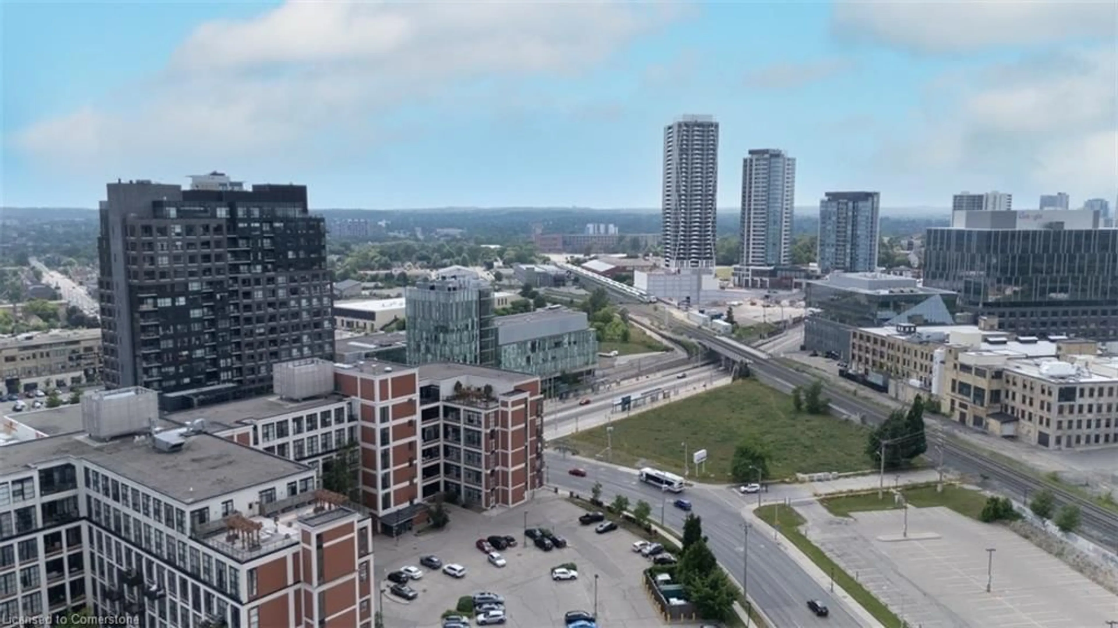 A pic from outside/outdoor area/front of a property/back of a property/a pic from drone, city buildings view from balcony for 1 Victoria St South St #509, Kitchener Ontario N2G 0B5