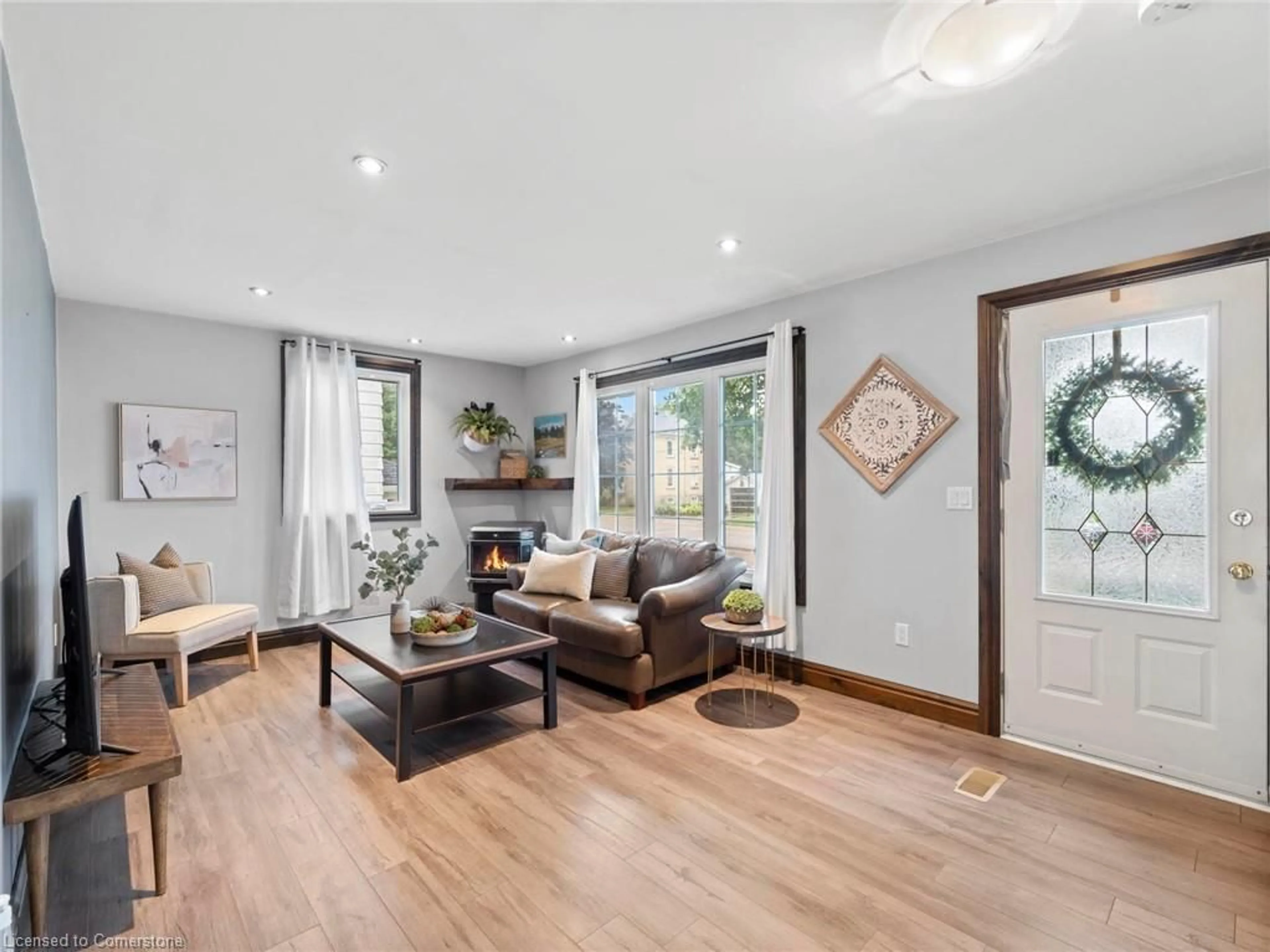 Living room with furniture, wood/laminate floor for 6992 Raglan St, Dublin Ontario N0K 1E0