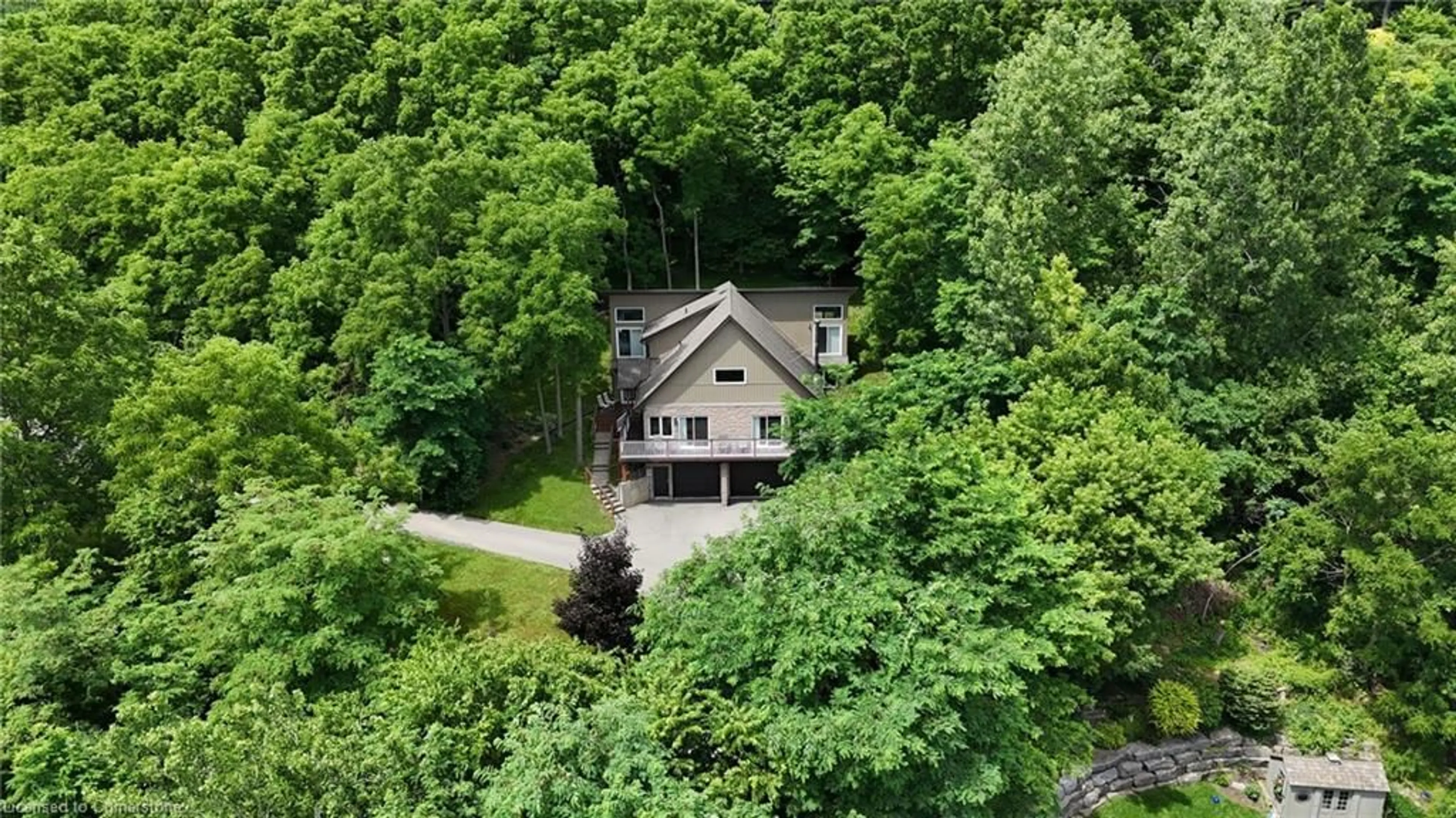 A pic from outside/outdoor area/front of a property/back of a property/a pic from drone, forest/trees view for 84 Carolinian Lane, Cambridge Ontario N1S 5B8