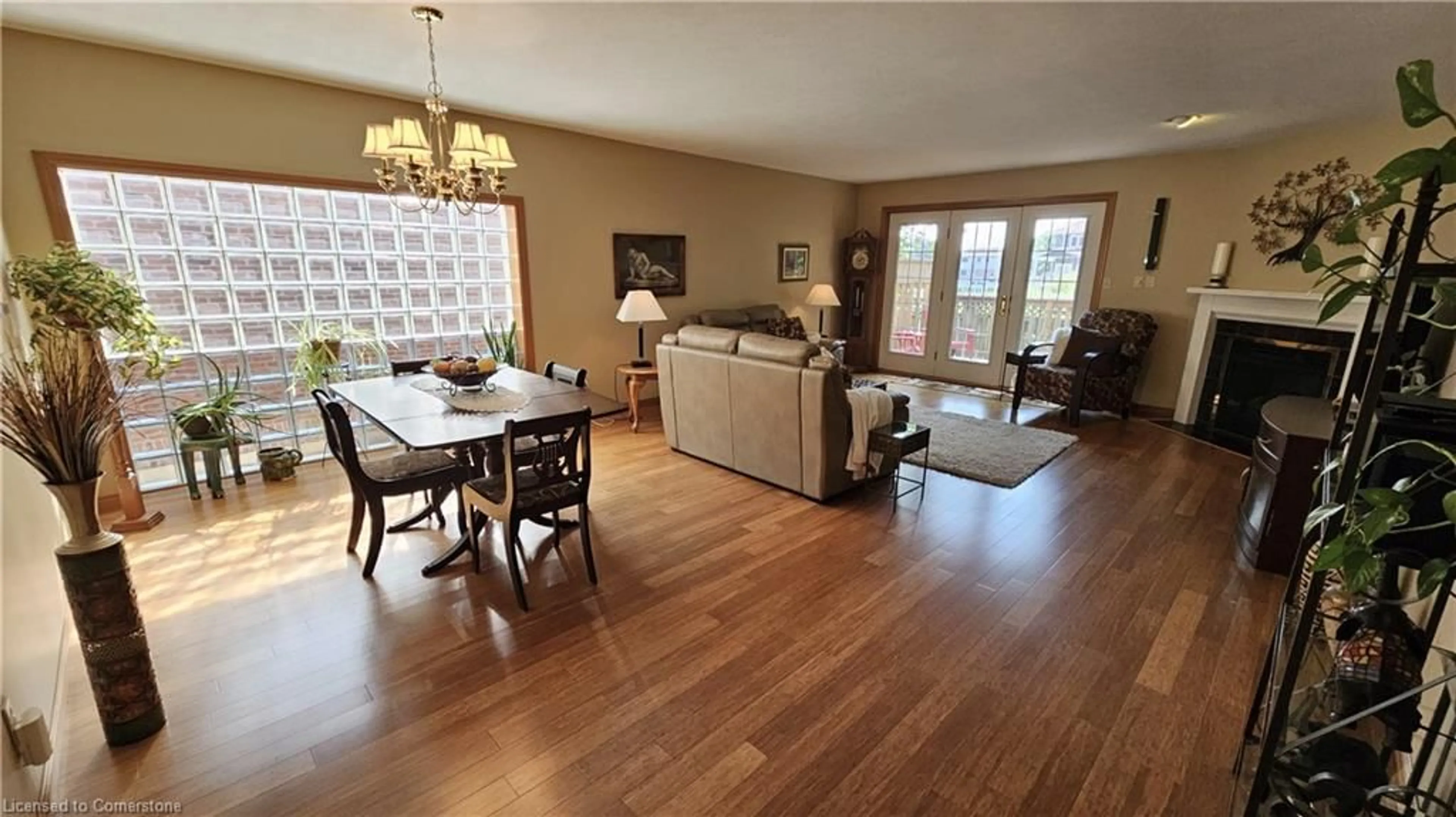 Living room with furniture, wood/laminate floor for 42 Donly Dr #11, Simcoe Ontario N3Y 5L2