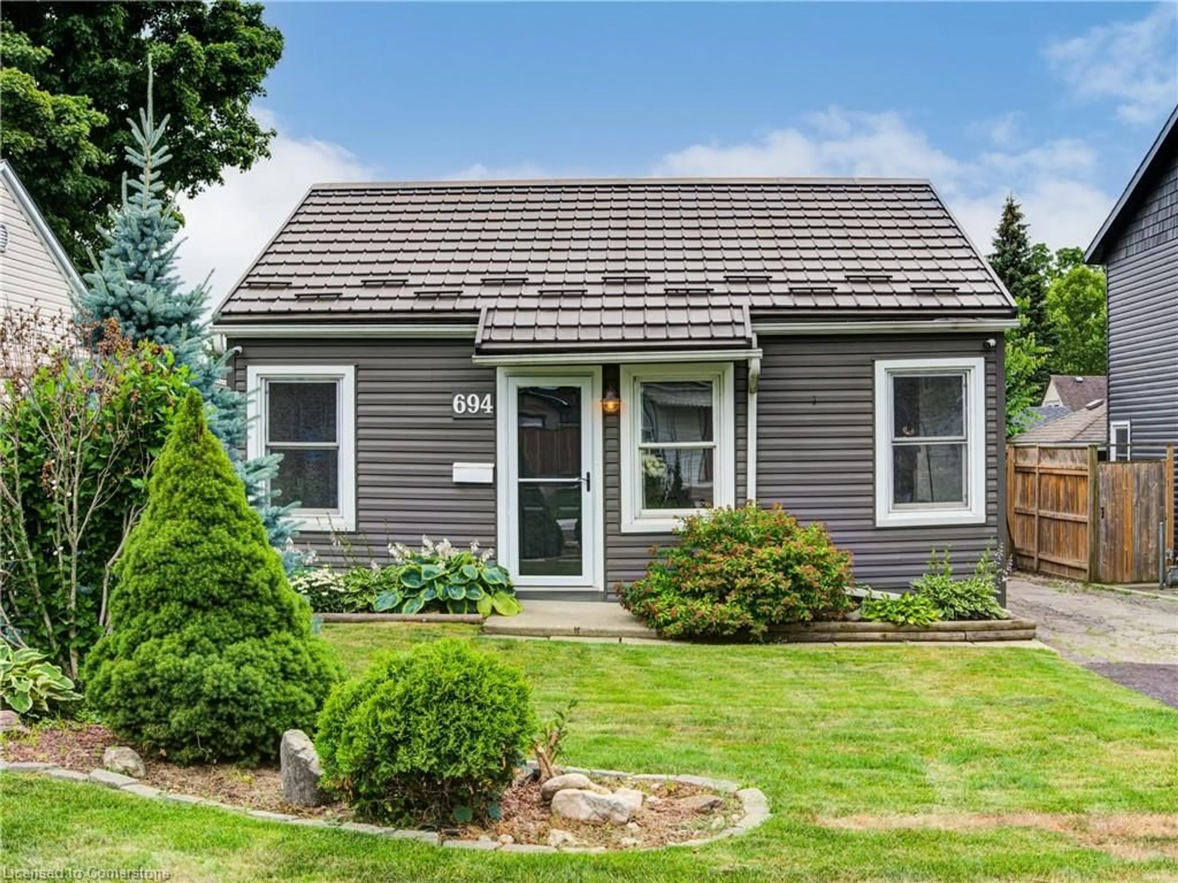 Home with vinyl exterior material, street for 694 Elizabeth St, Woodstock Ontario N4S 5B7