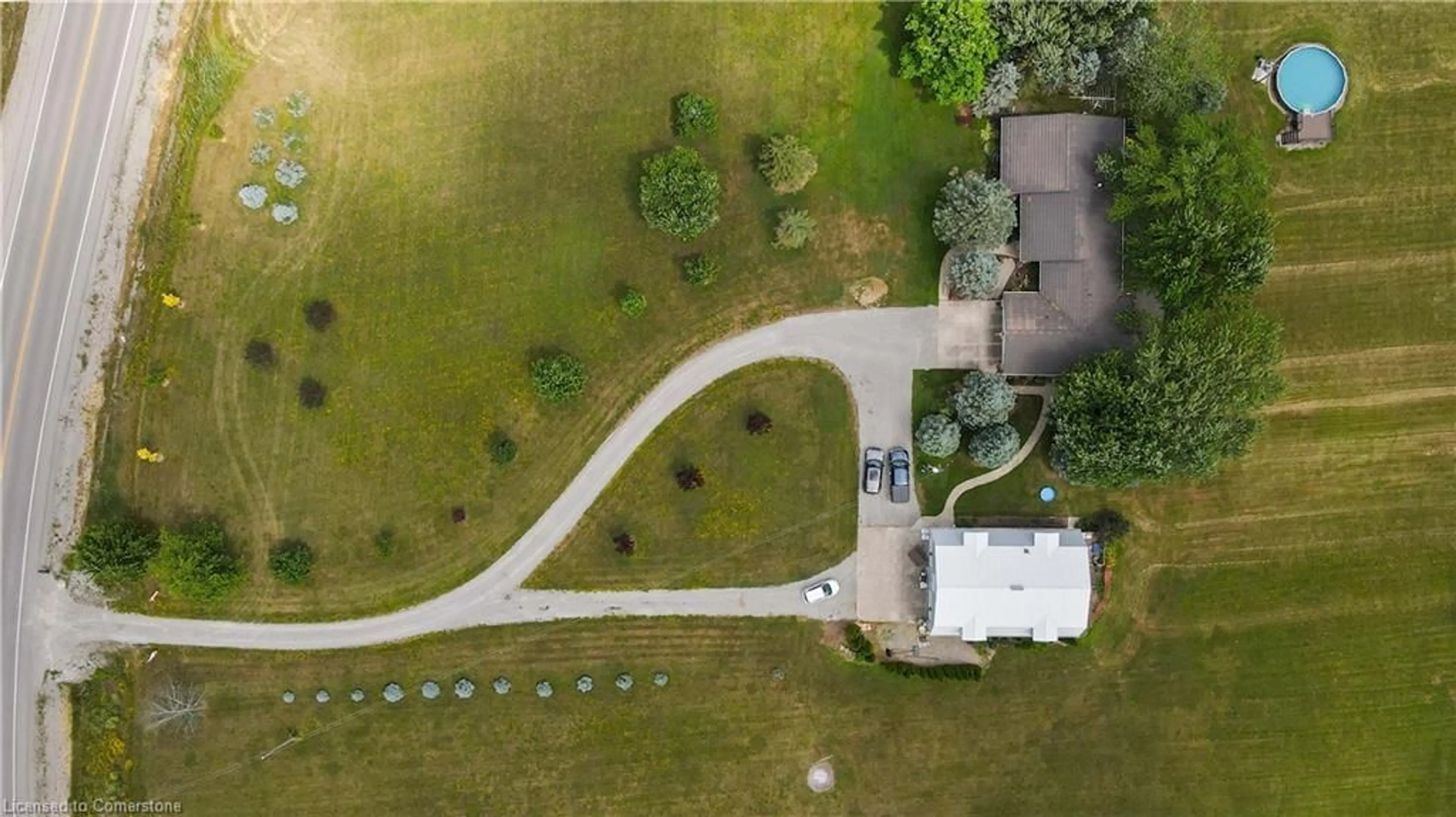 A pic from outside/outdoor area/front of a property/back of a property/a pic from drone, street for 895 Smithville Rd, Wellandport Ontario L0R 2J0