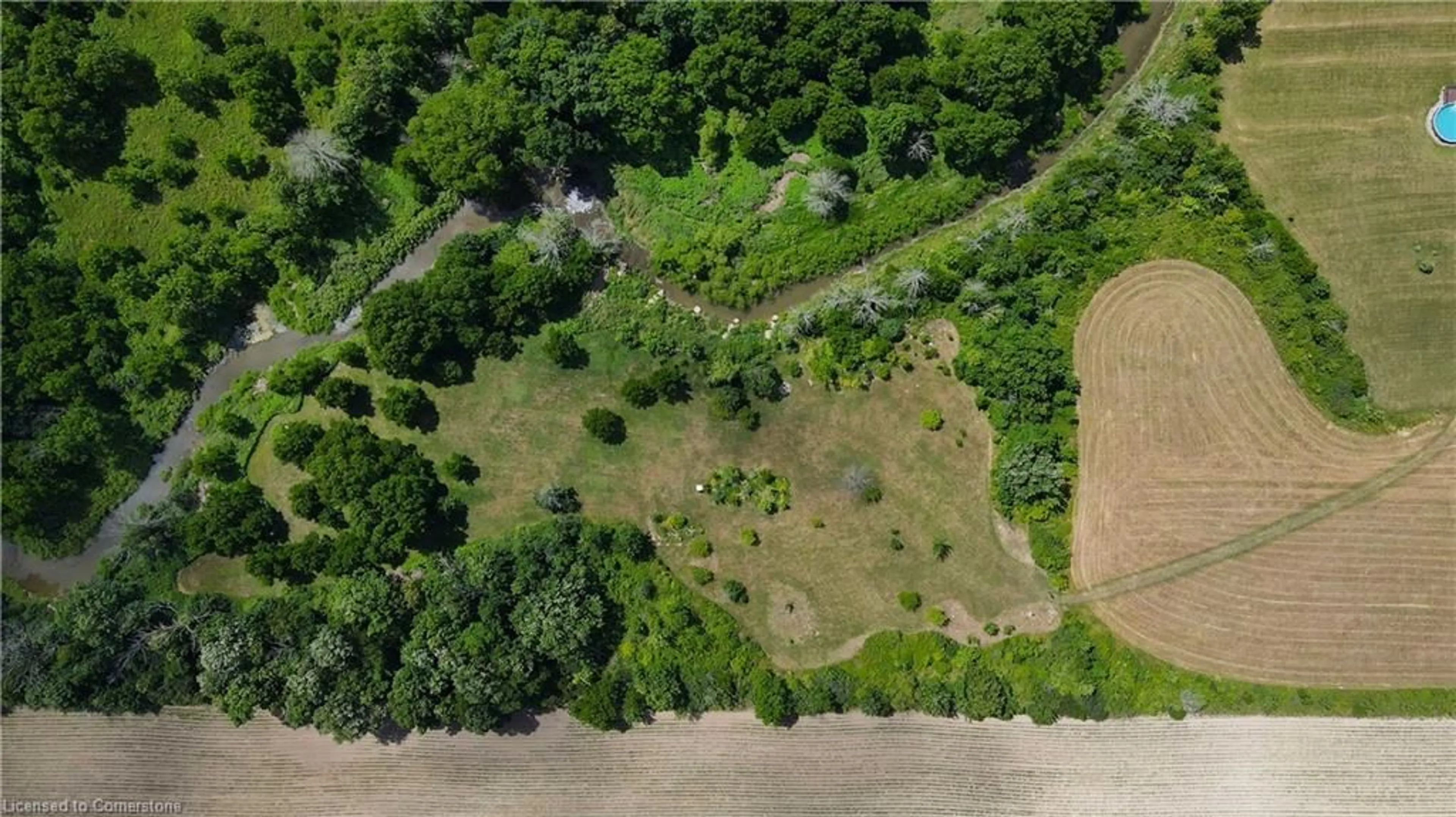 A pic from outside/outdoor area/front of a property/back of a property/a pic from drone, water/lake/river/ocean view for 895 Smithville Rd, Wellandport Ontario L0R 2J0