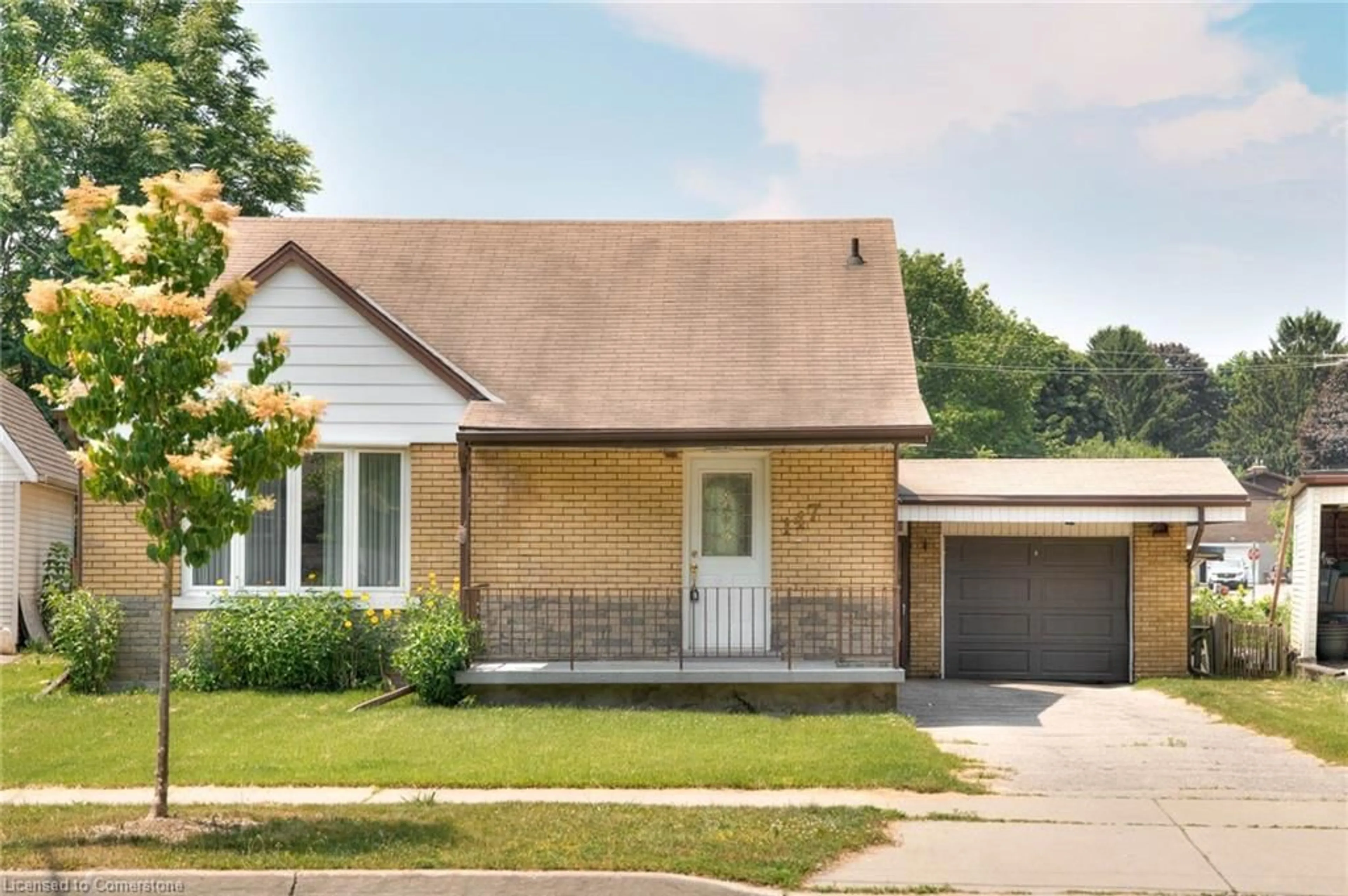 Home with brick exterior material, street for 147 Clark Ave, Kitchener Ontario N2C 1Y1