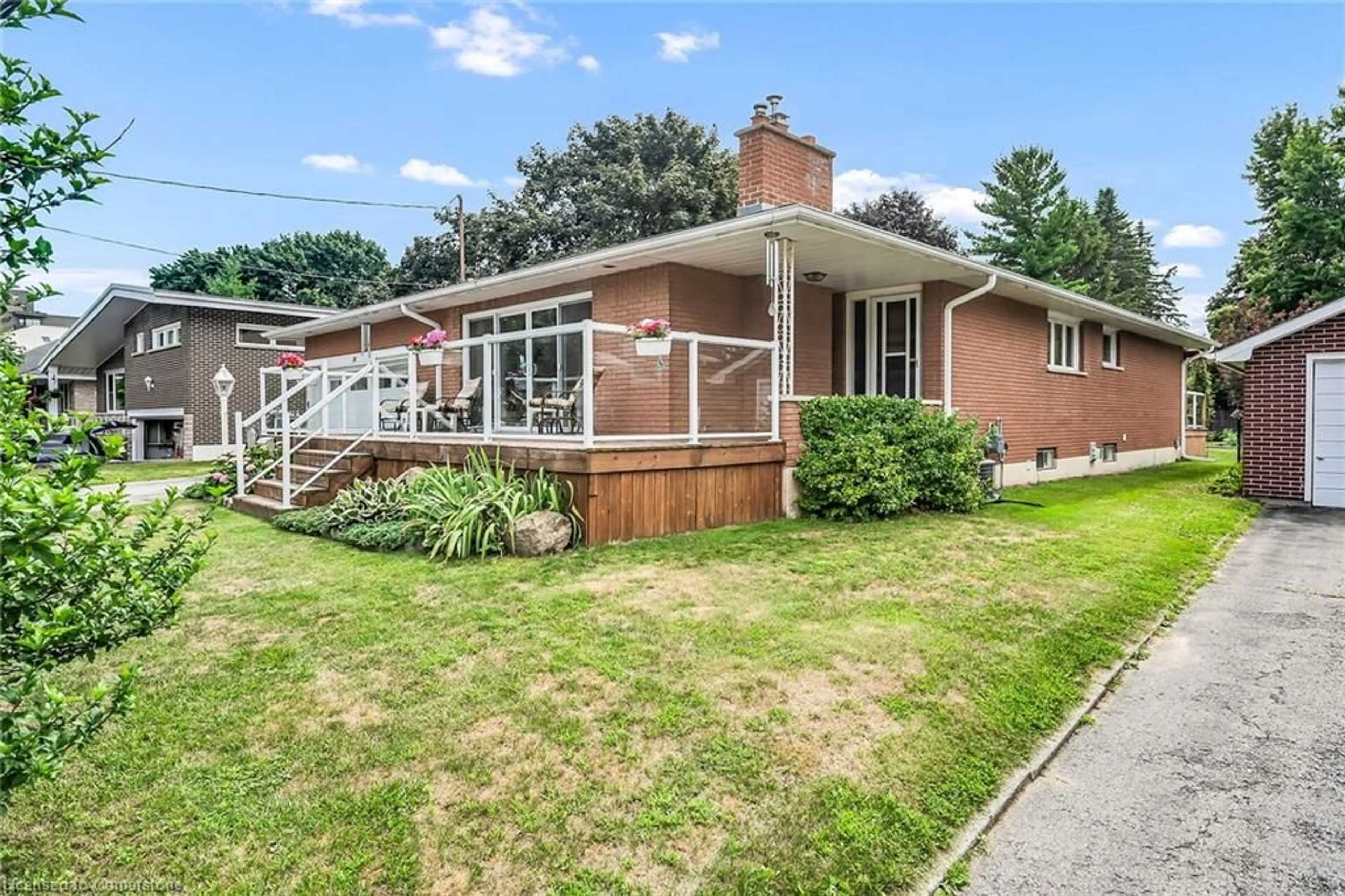 Home with brick exterior material, street for 14 Payne Ave, Simcoe Ontario N3Y 4C1
