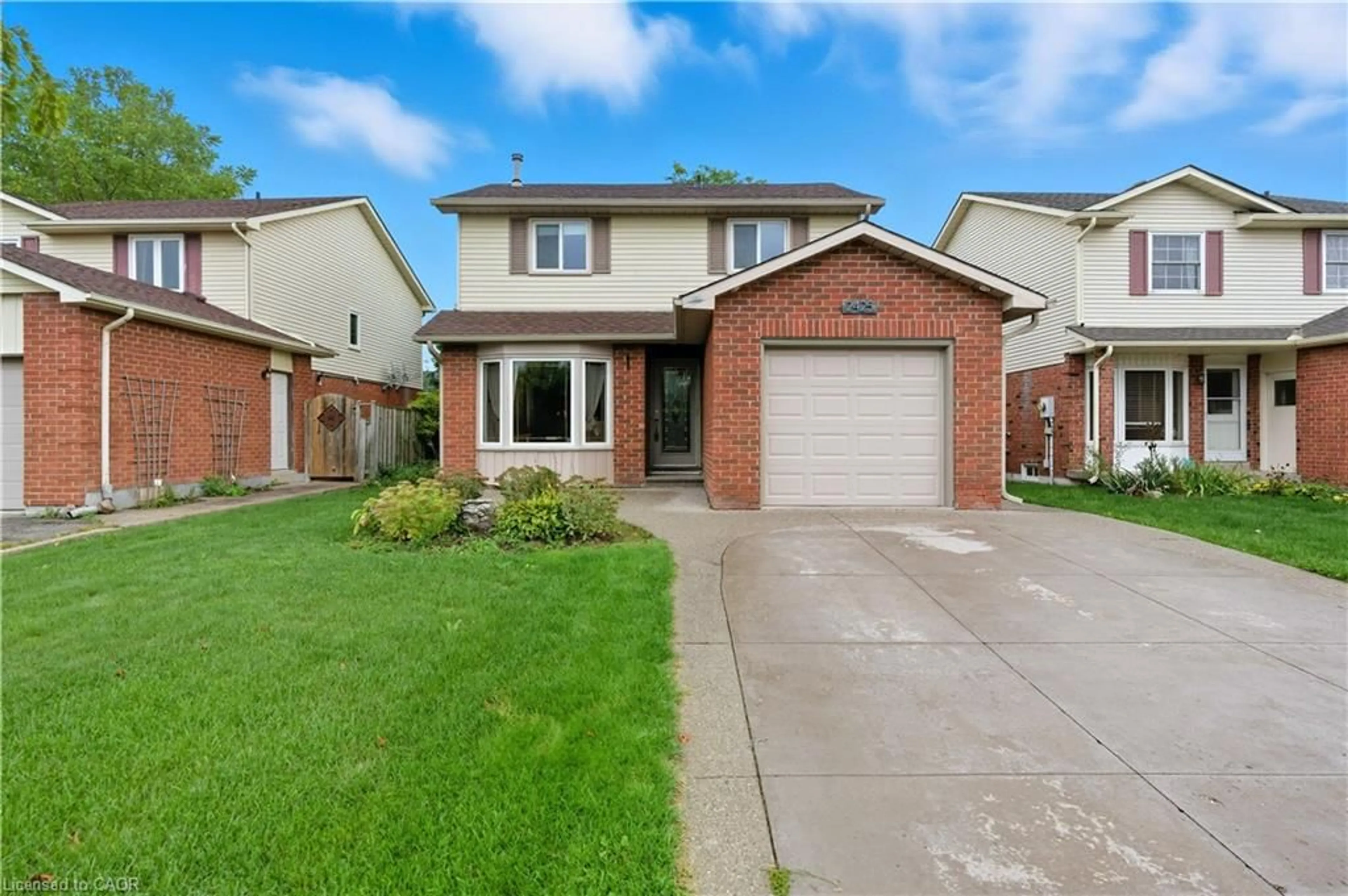 Home with brick exterior material, street for 2425 Headon Forest Dr, Burlington Ontario L7M 3K7