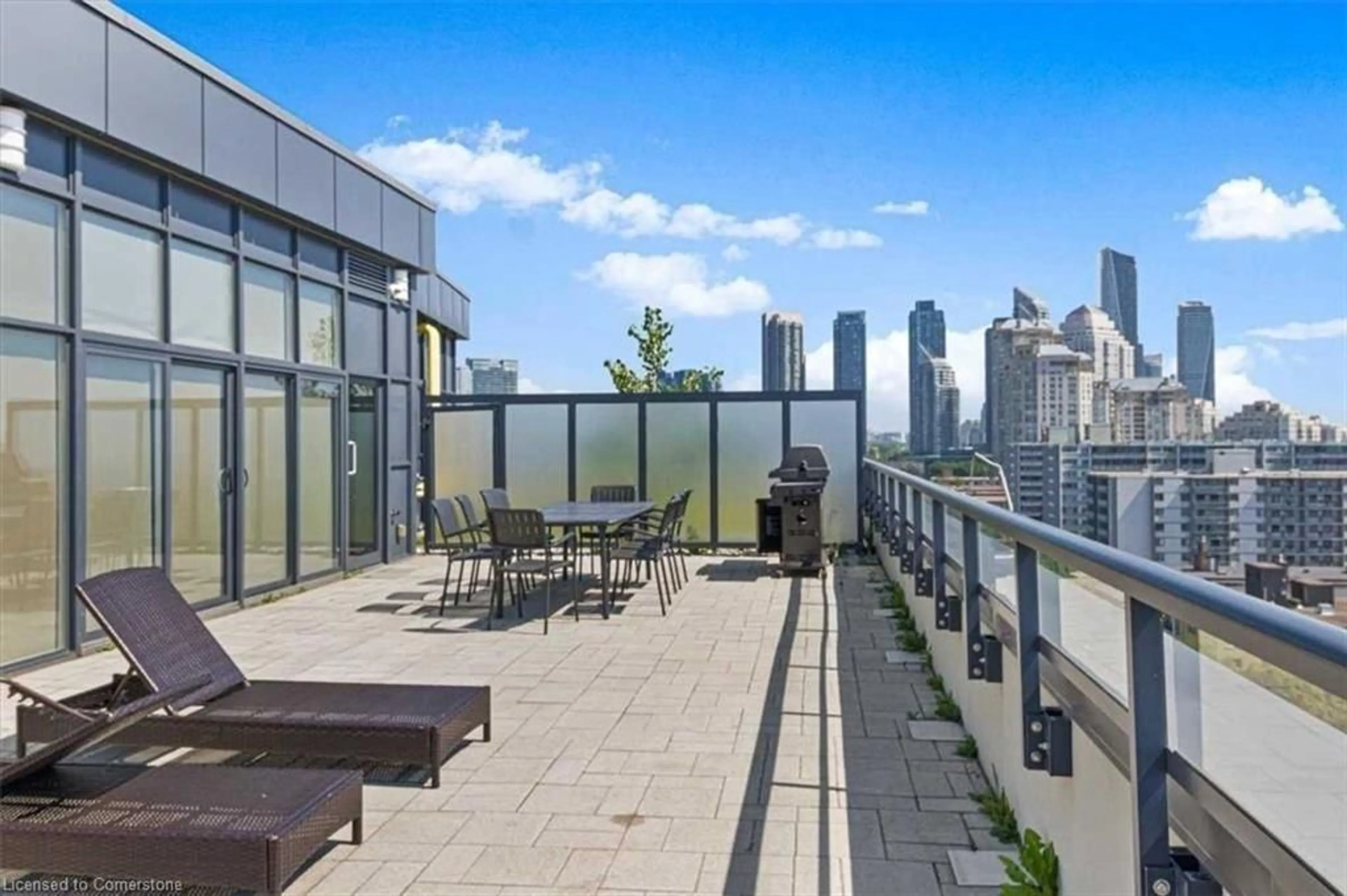 Patio, city buildings view from balcony for 11 Superior Ave #TH1, Toronto Ontario M8V 0A7