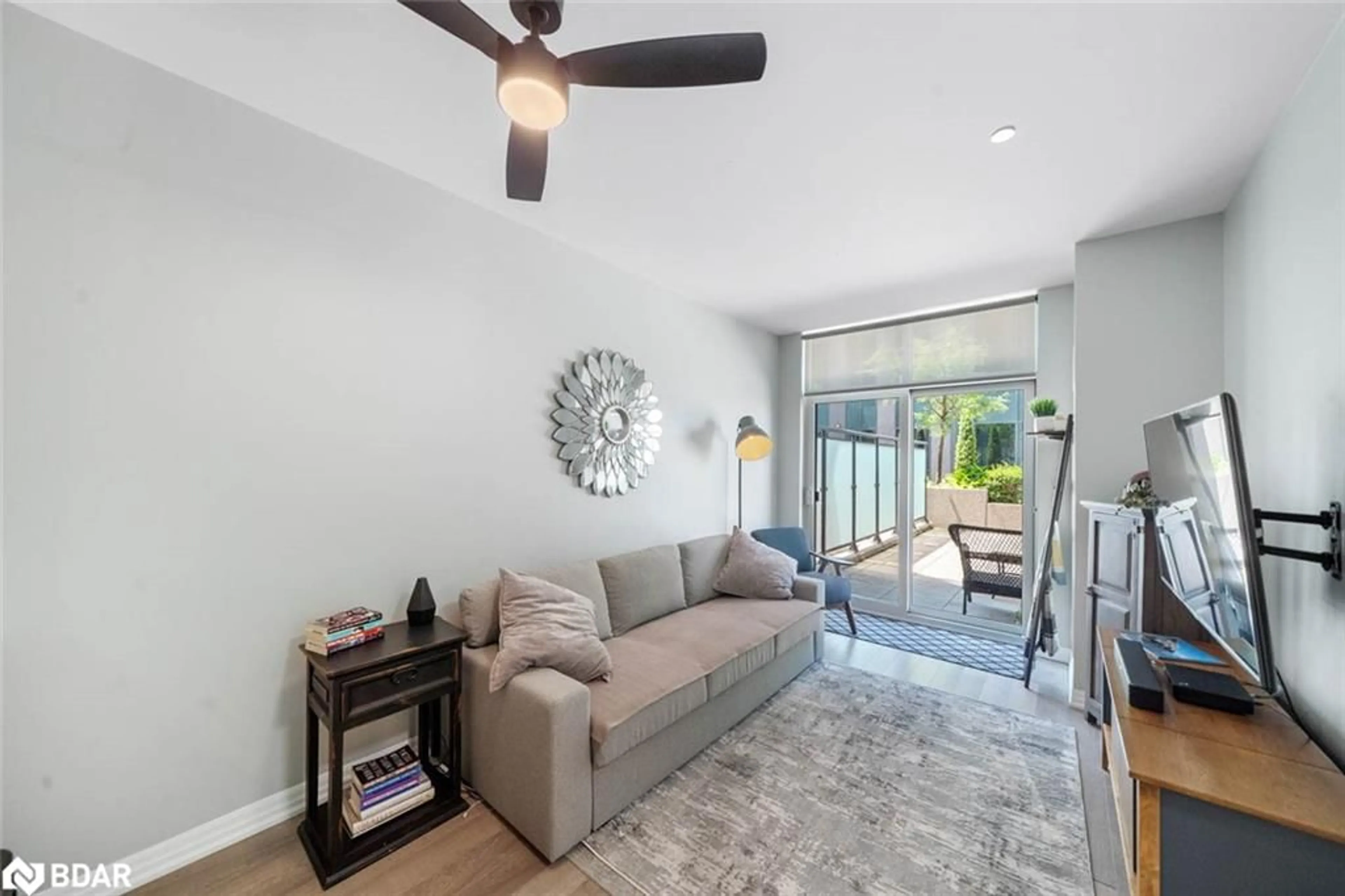 Living room with furniture, unknown for 111 Worsley Street #302, Barrie Ontario L4M 0J5