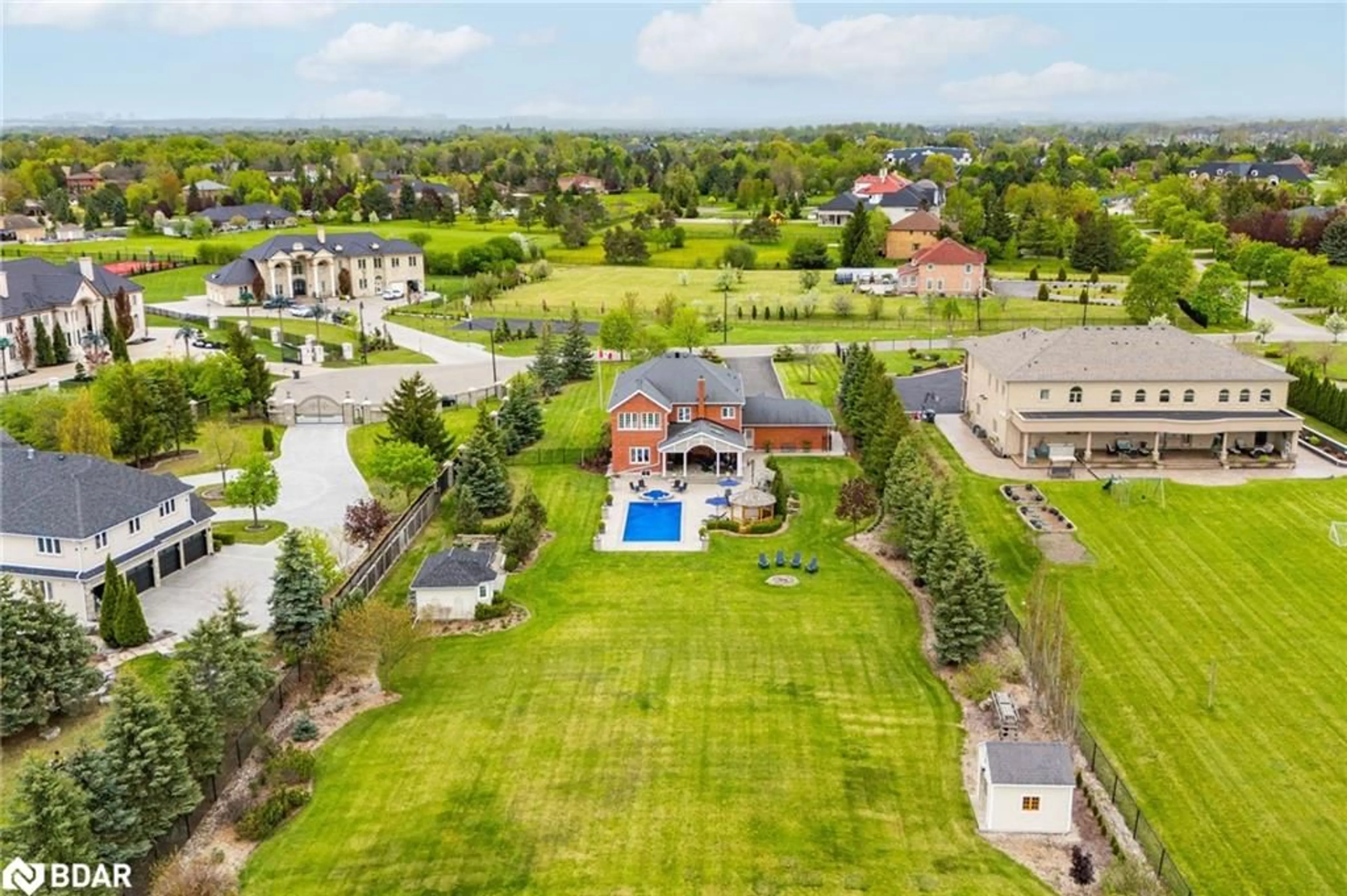 A pic from outside/outdoor area/front of a property/back of a property/a pic from drone, water/lake/river/ocean view for 12 Everglade Dr, Brampton Ontario L6P 0R2