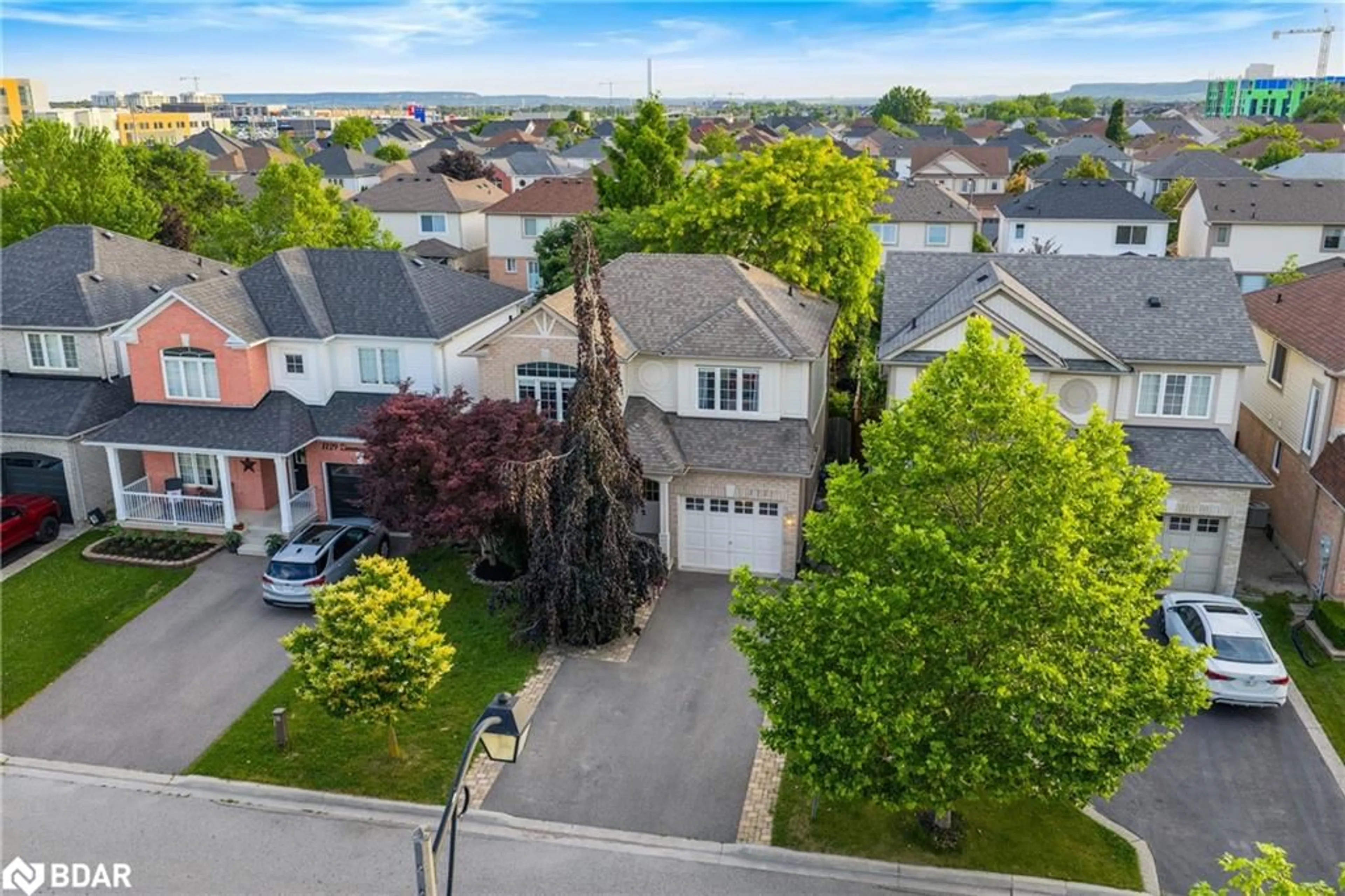 A pic from outside/outdoor area/front of a property/back of a property/a pic from drone, street for 1131 Zimmerman Cres, Milton Ontario L9T 5T2