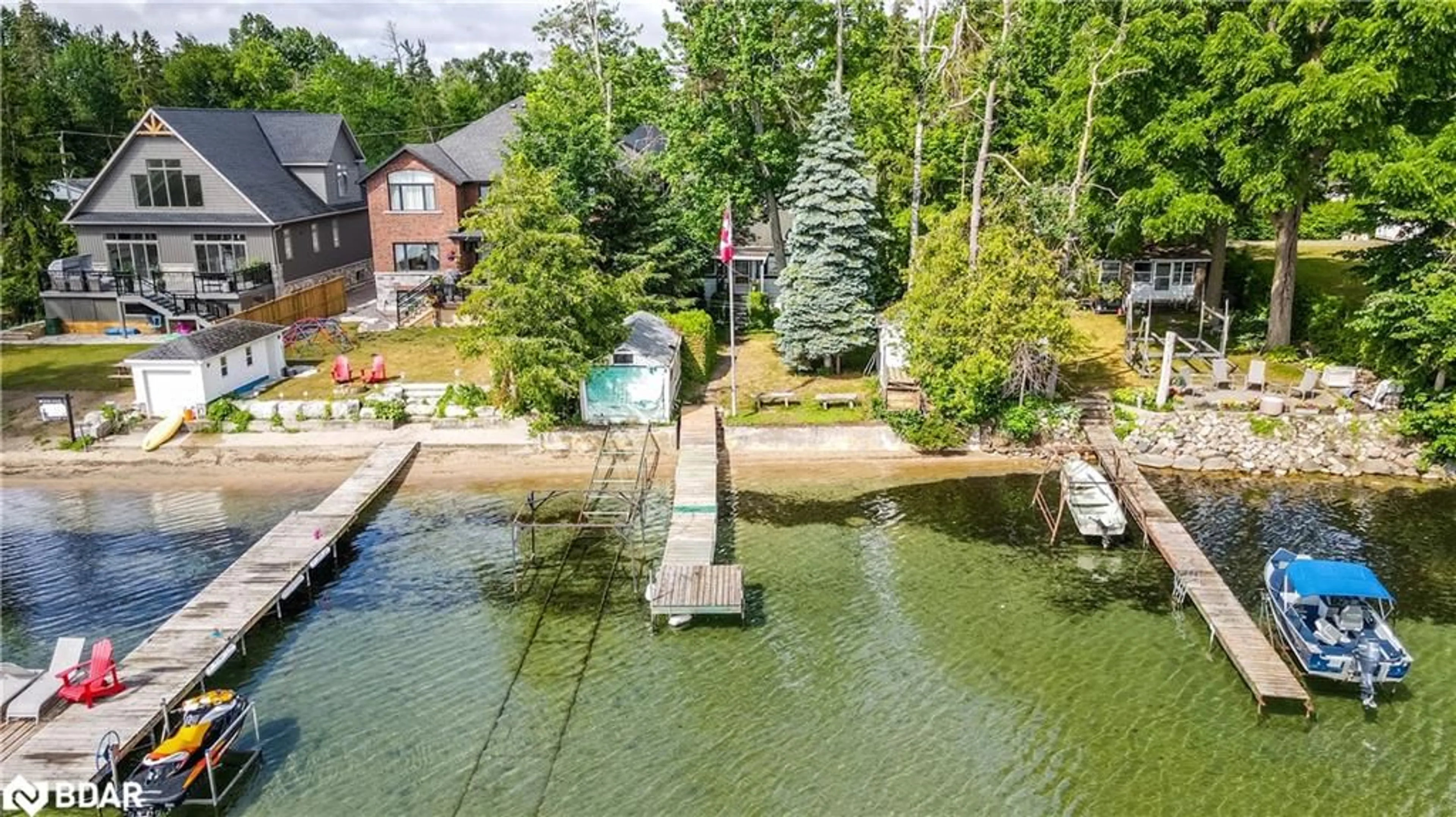 A pic from outside/outdoor area/front of a property/back of a property/a pic from drone, water/lake/river/ocean view for 1895 Simcoe Blvd, Innisfil Ontario L9S 4N3