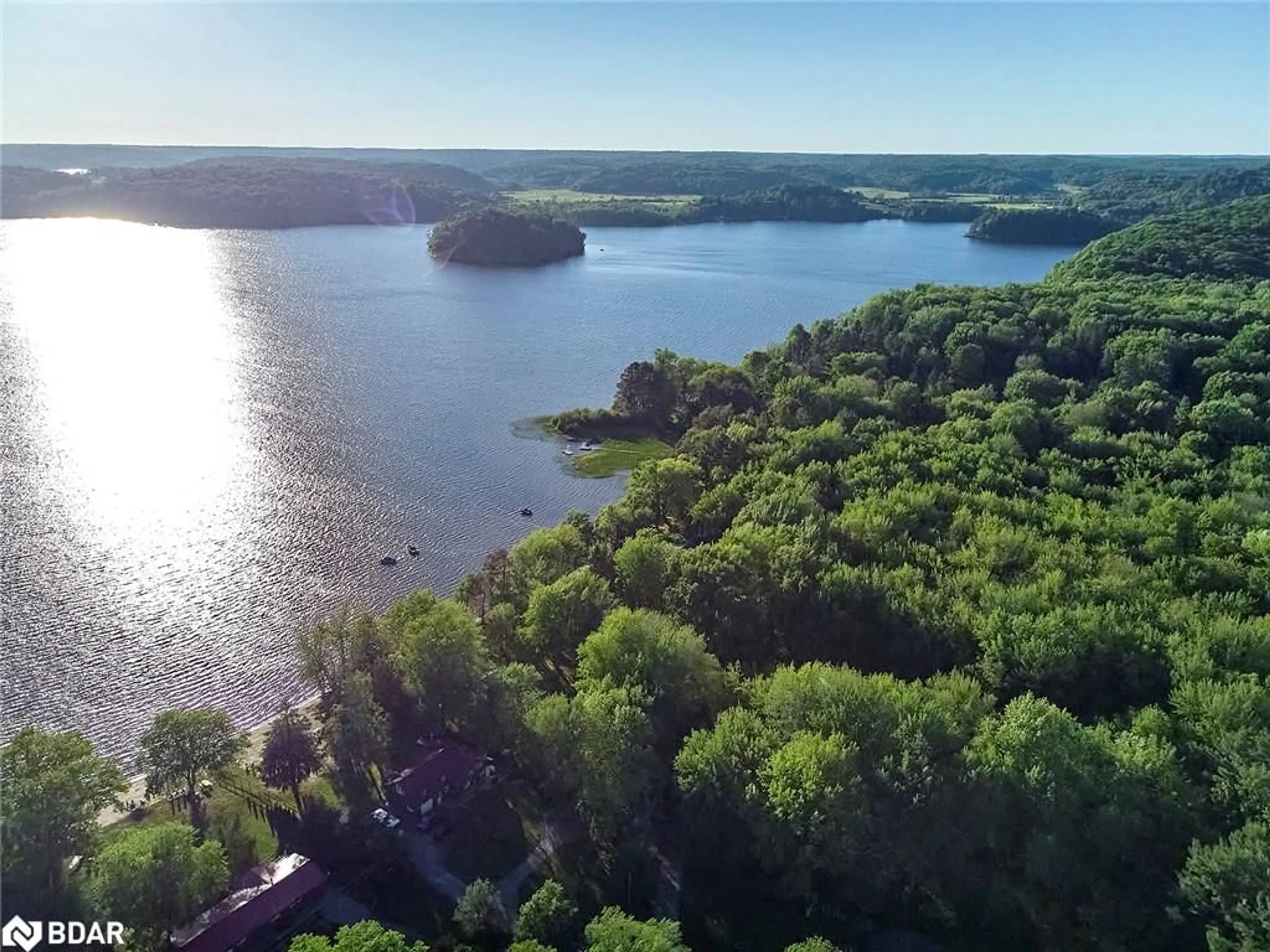 A pic from outside/outdoor area/front of a property/back of a property/a pic from drone, water/lake/river/ocean view for 1017 Wonder Beach Rd, Utterson Ontario P0B 1M0