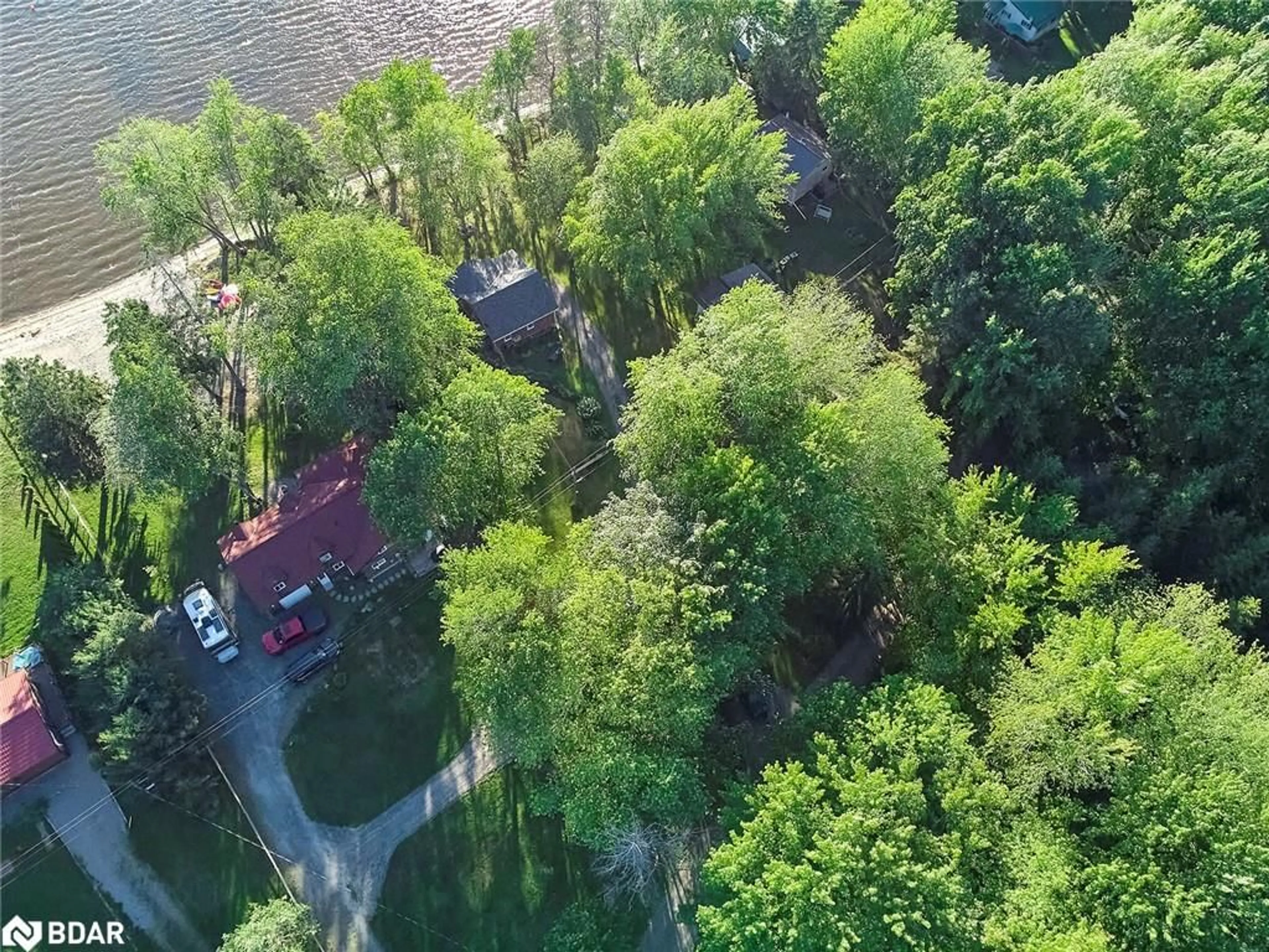 A pic from outside/outdoor area/front of a property/back of a property/a pic from drone, forest/trees view for 1017 Wonder Beach Rd, Utterson Ontario P0B 1M0