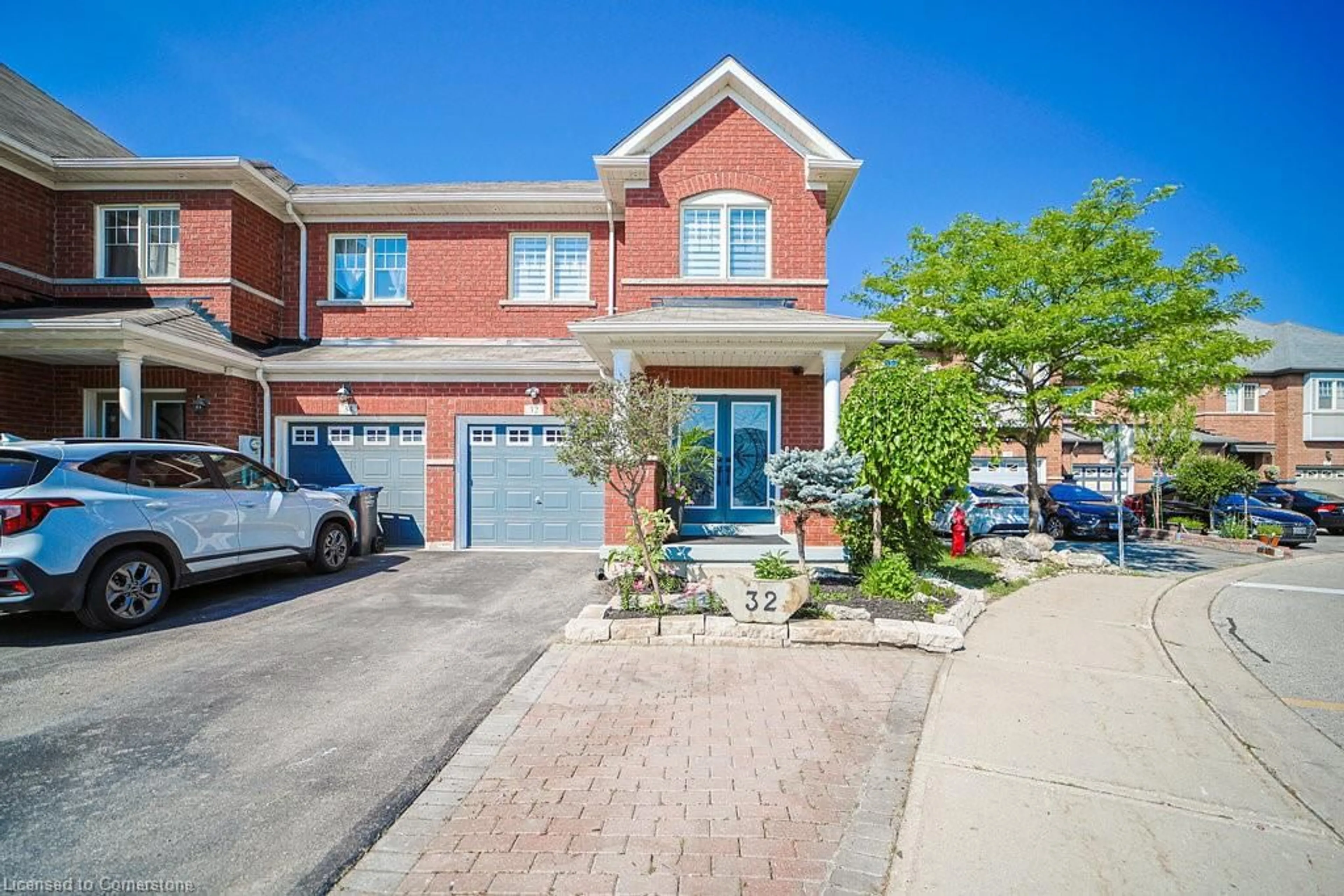 Home with brick exterior material, street for 32 Davenhill Rd, Brampton Ontario L6P 3E1