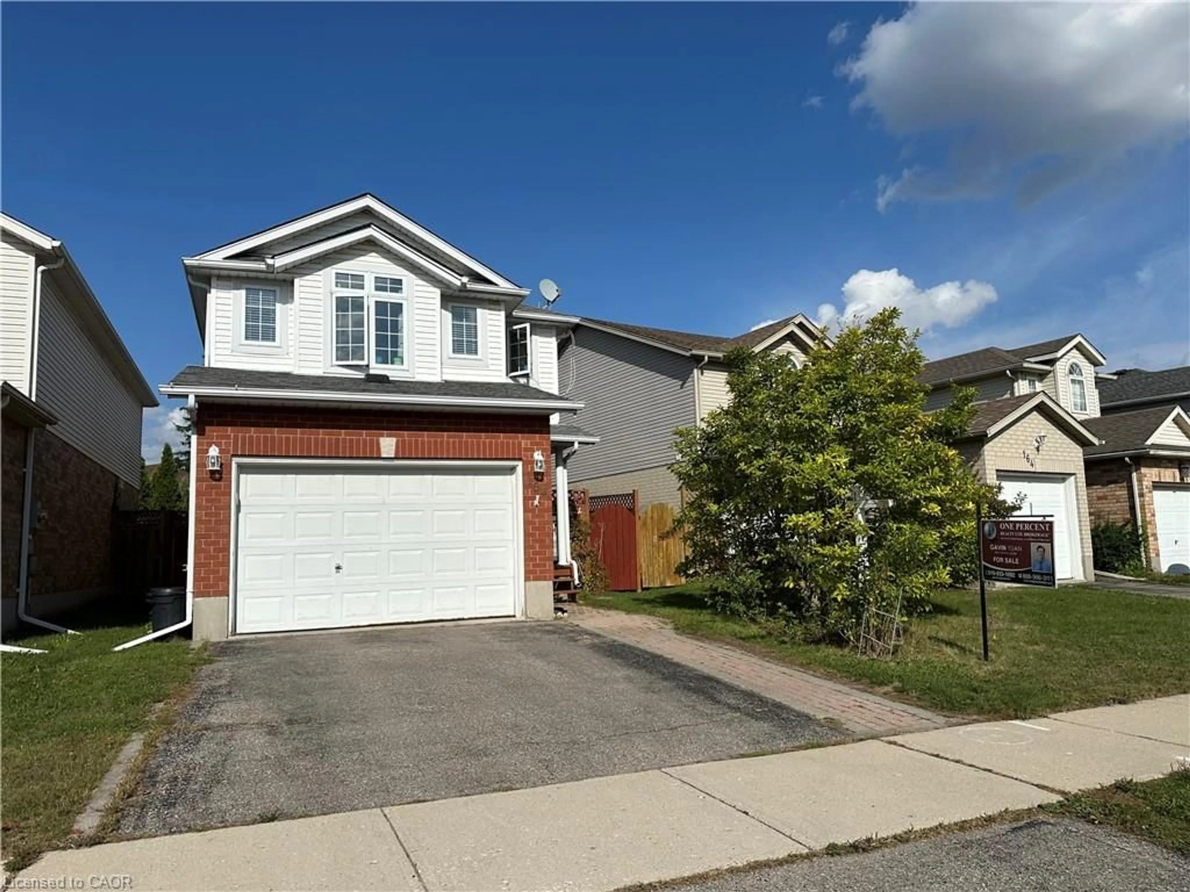 Home with vinyl exterior material, street for 158 Wilderness Dr, Kitchener Ontario N2E 3R7