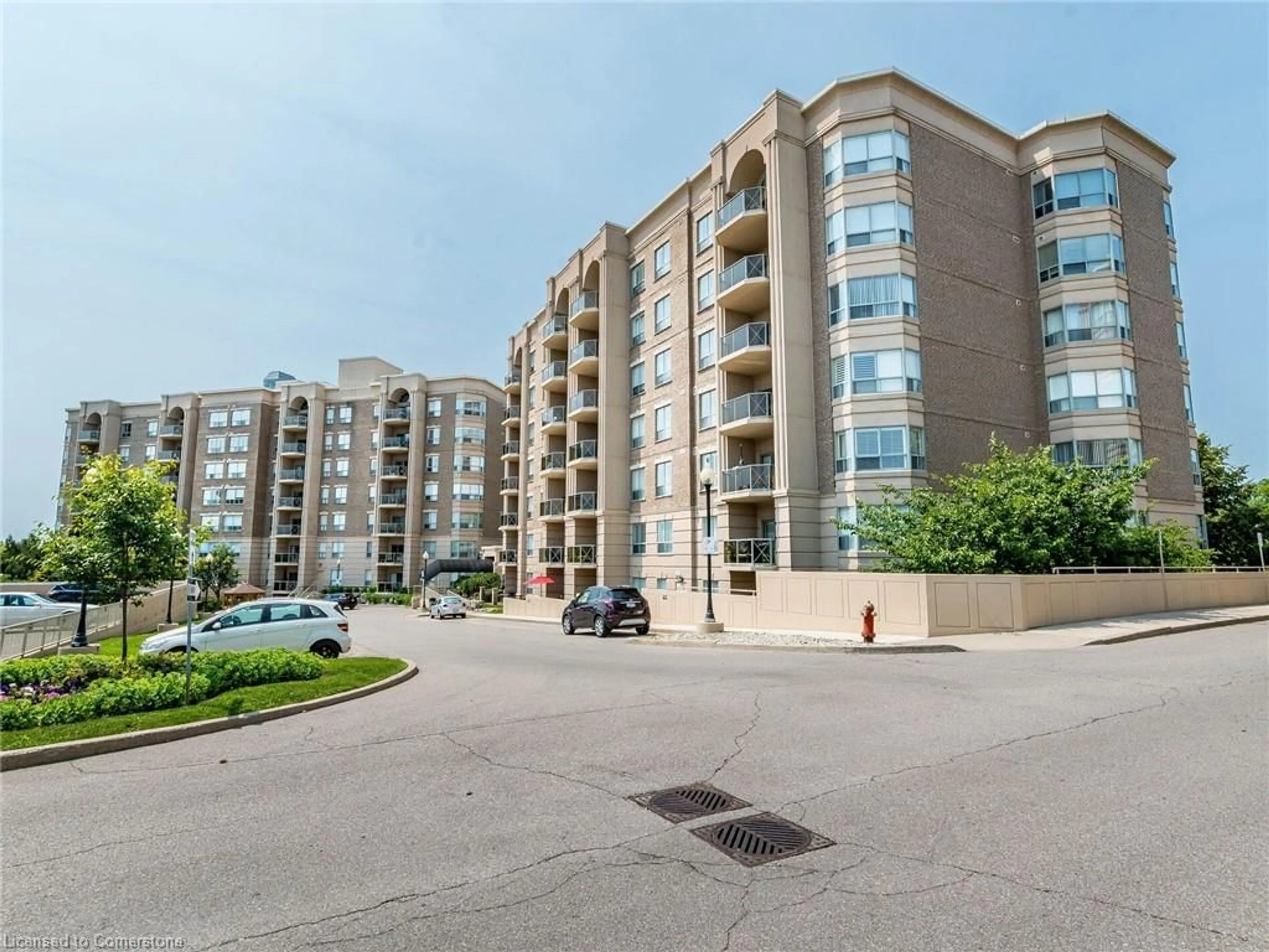 A pic from outside/outdoor area/front of a property/back of a property/a pic from drone, street for 2085 Amherst Hts #203, Burlington Ontario L7P 5C2