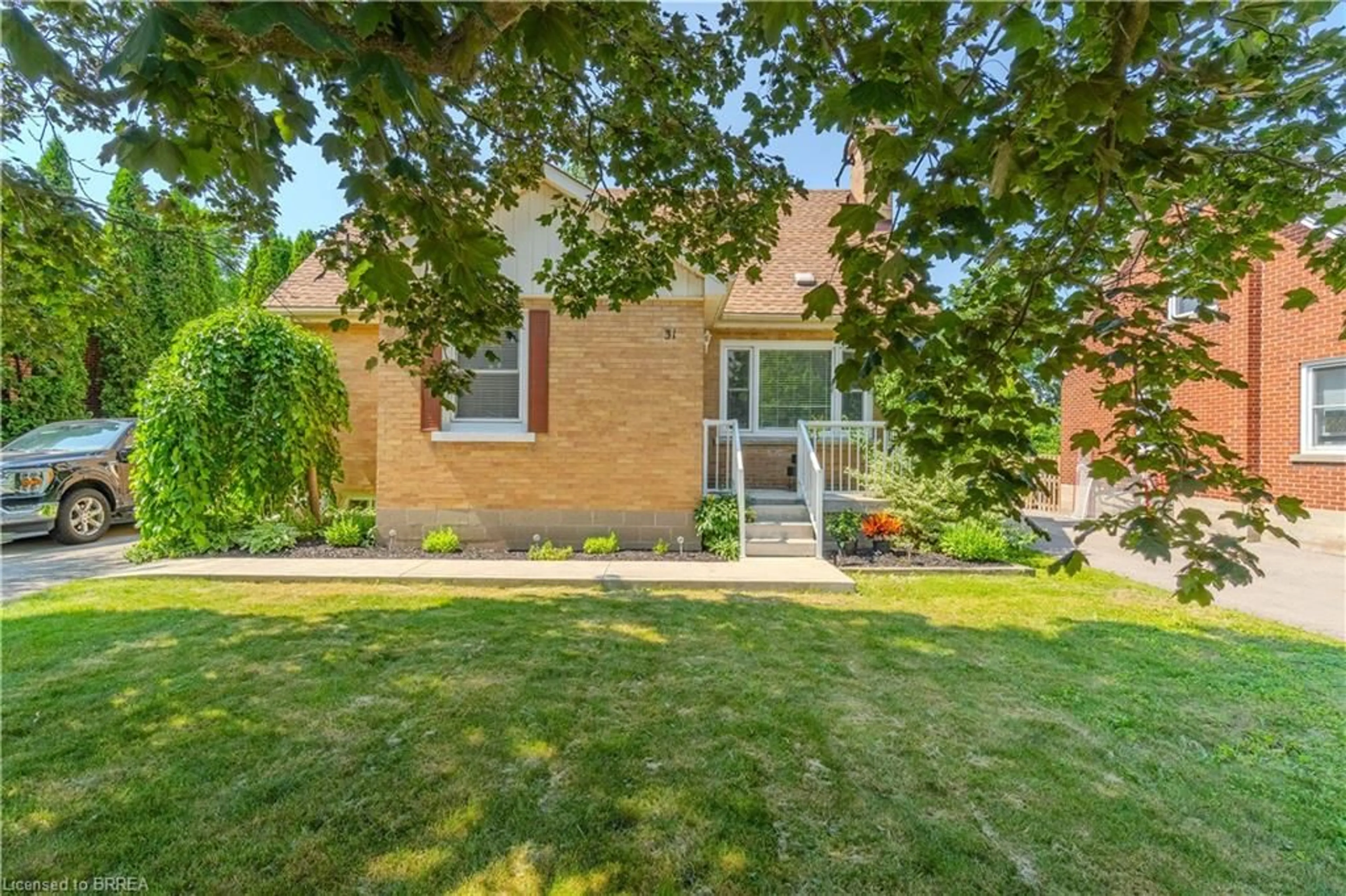 Home with brick exterior material, street for 31 Capron St, Paris Ontario N3L 1P8