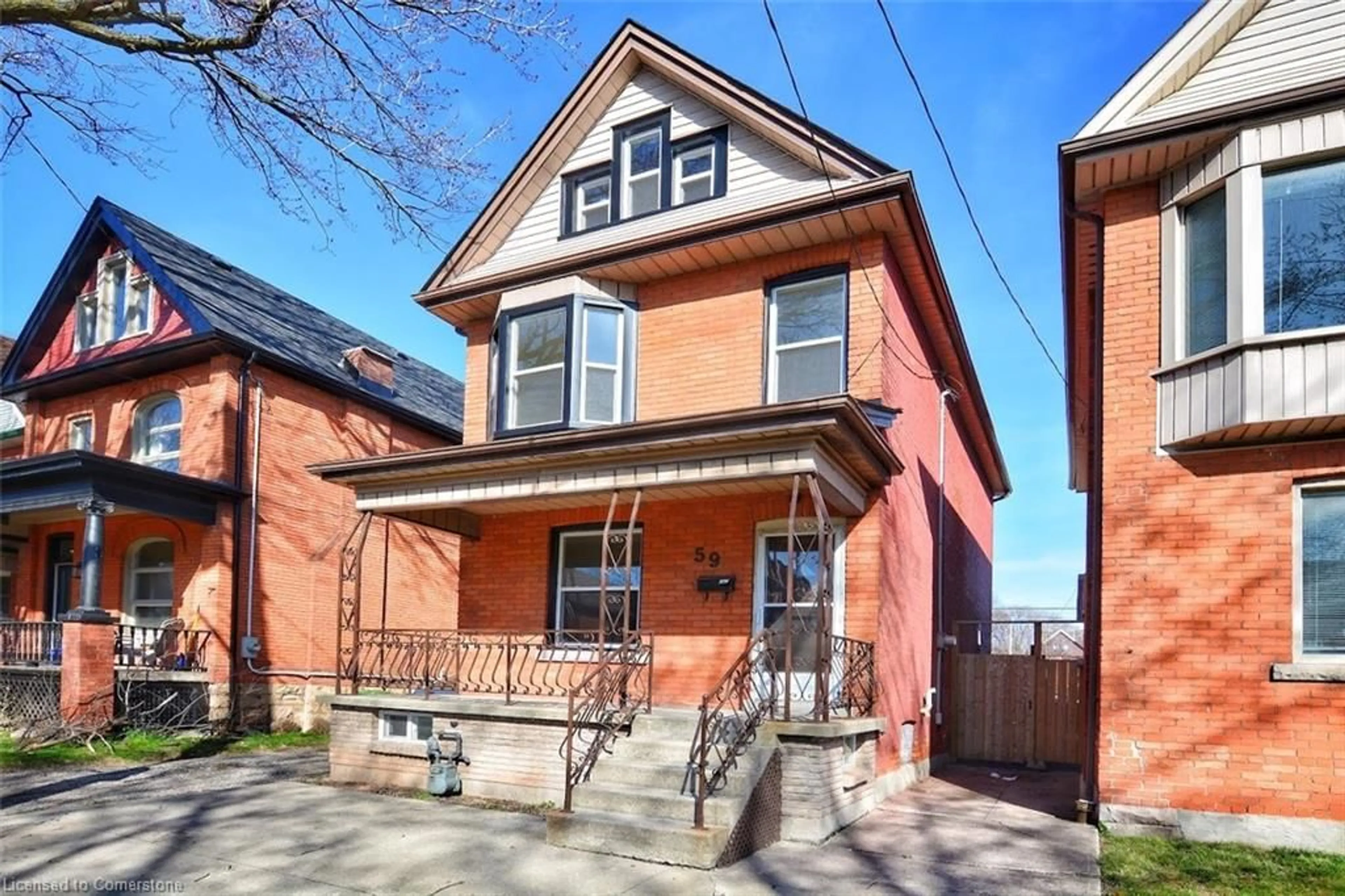 Home with brick exterior material, street for 59 Strathcona Ave, Hamilton Ontario L8P 4J1