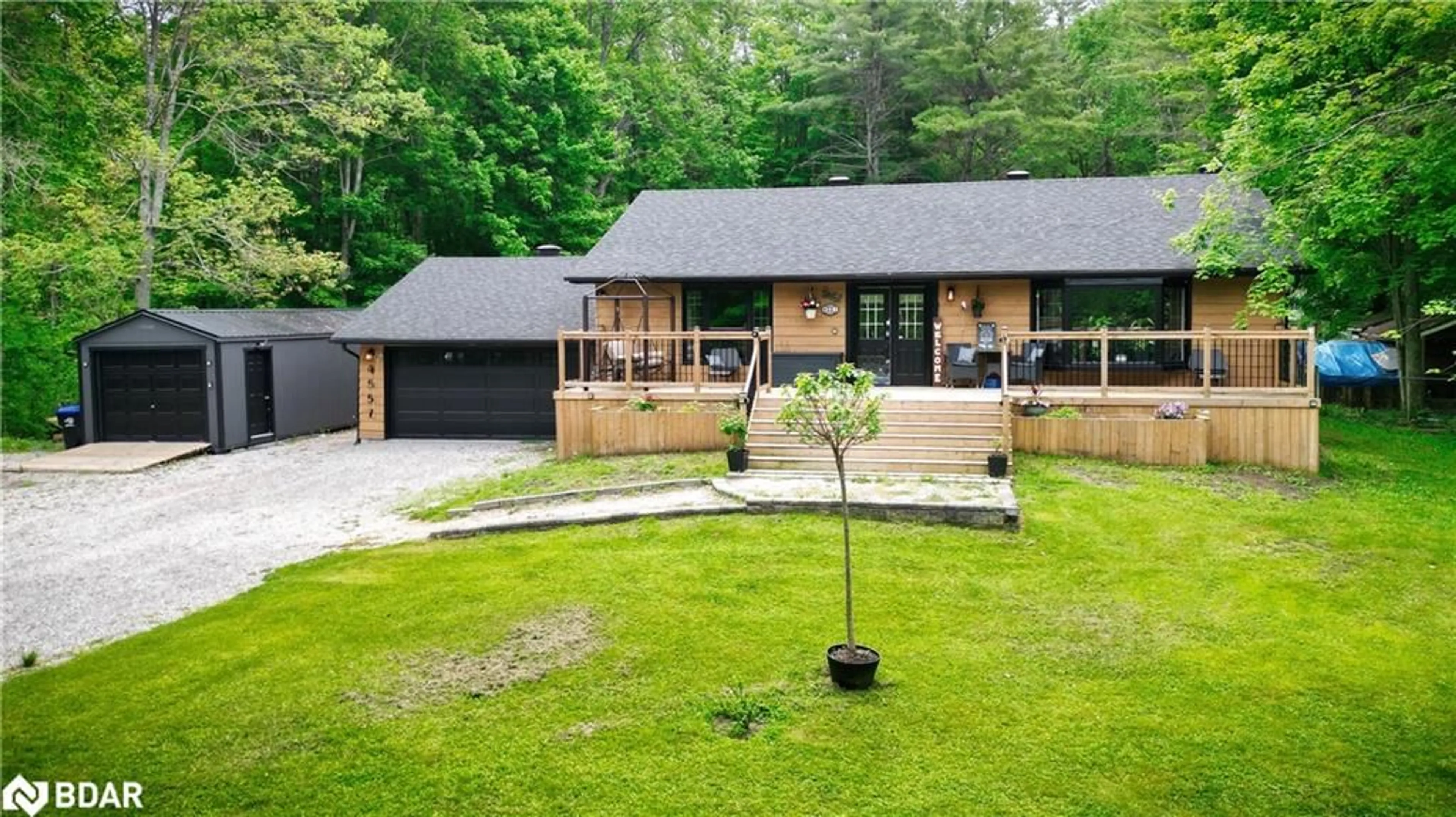 A pic from outside/outdoor area/front of a property/back of a property/a pic from drone, street for 4557 Trent Trail, Washago Ontario L0K 2B0