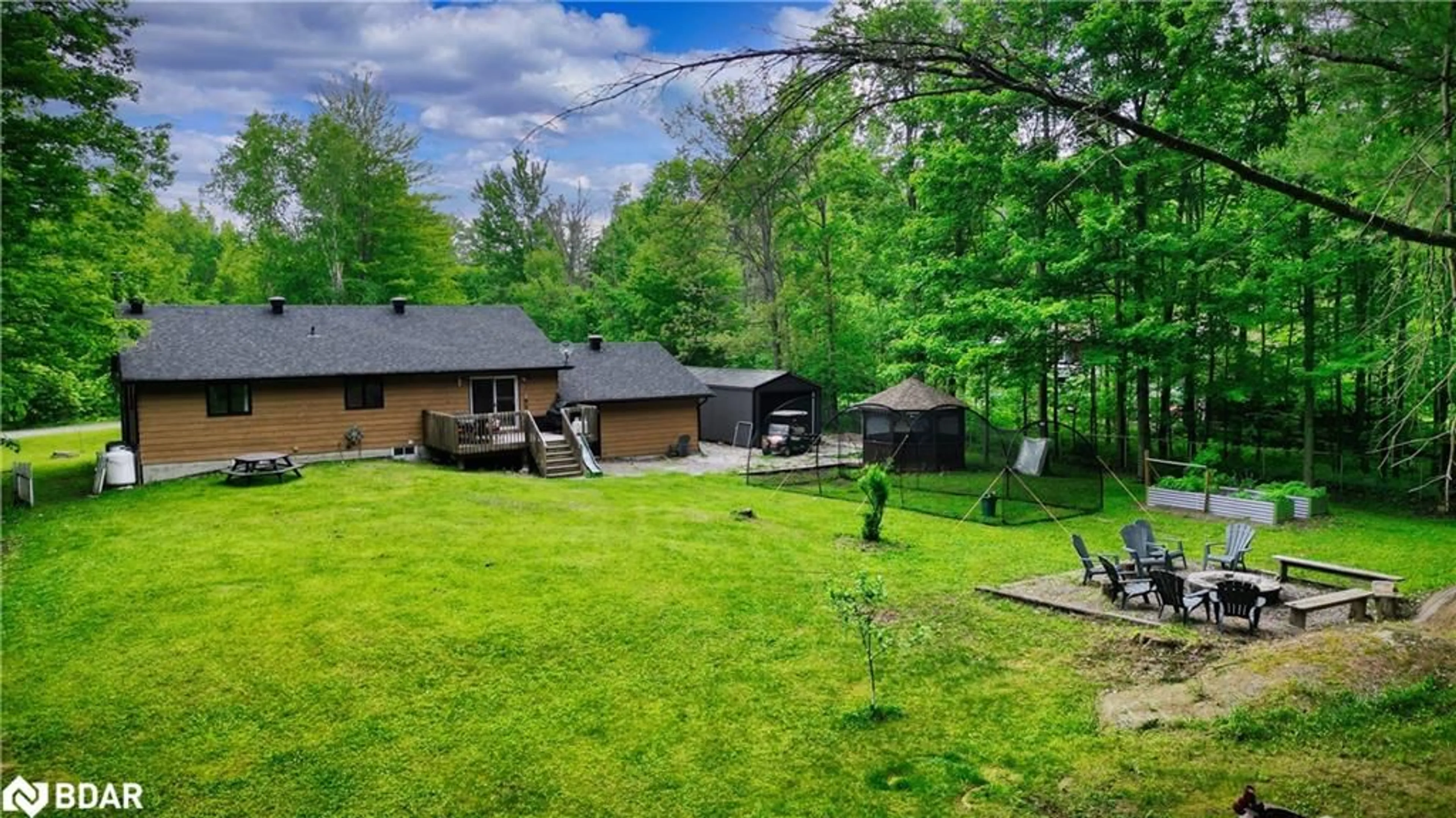 A pic from outside/outdoor area/front of a property/back of a property/a pic from drone, forest/trees view for 4557 Trent Trail, Washago Ontario L0K 2B0