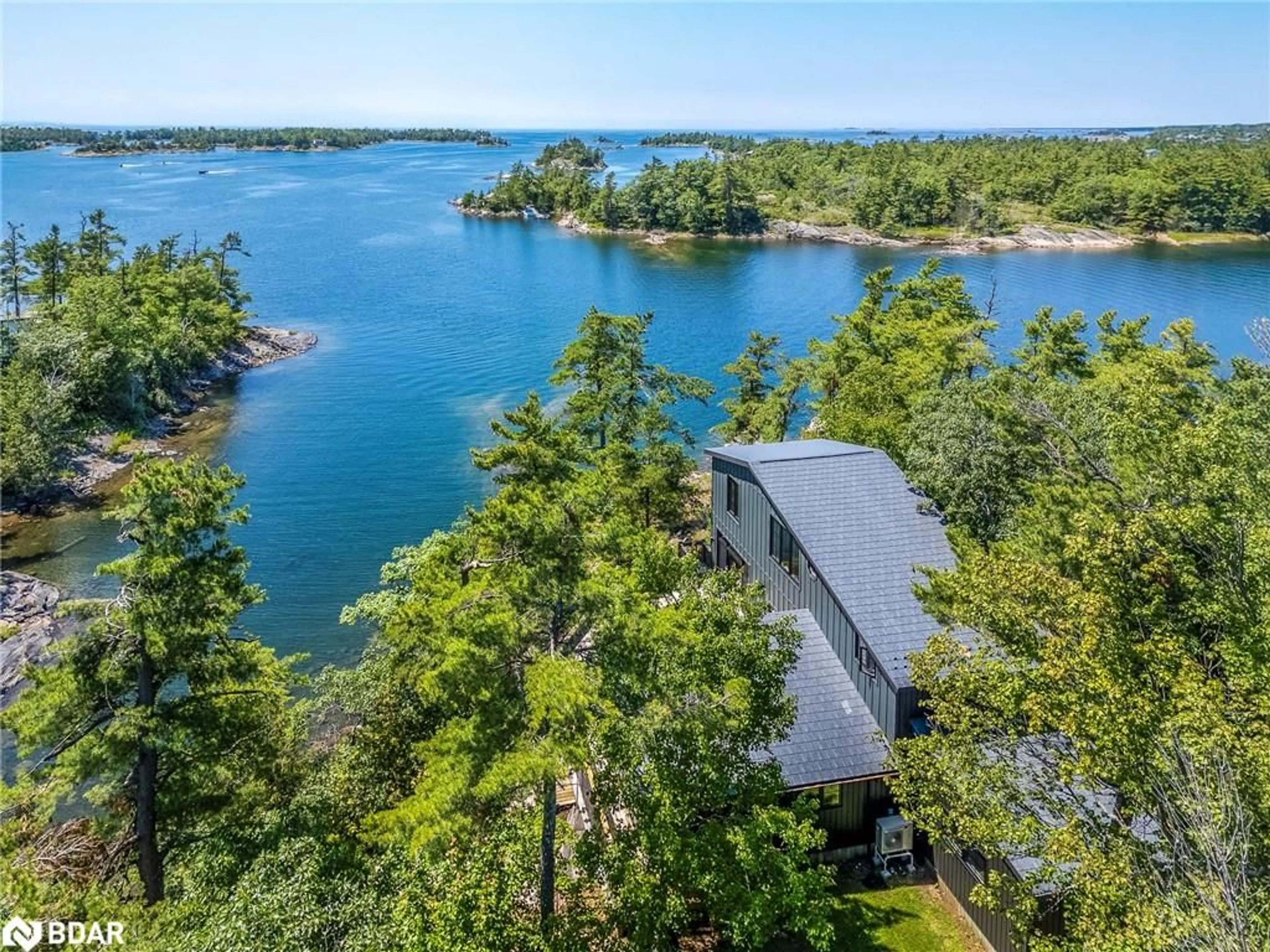 A pic from outside/outdoor area/front of a property/back of a property/a pic from drone, water/lake/river/ocean view for 1 Gb466 Island, ARCHIPELAGO Ontario P2A 1T2