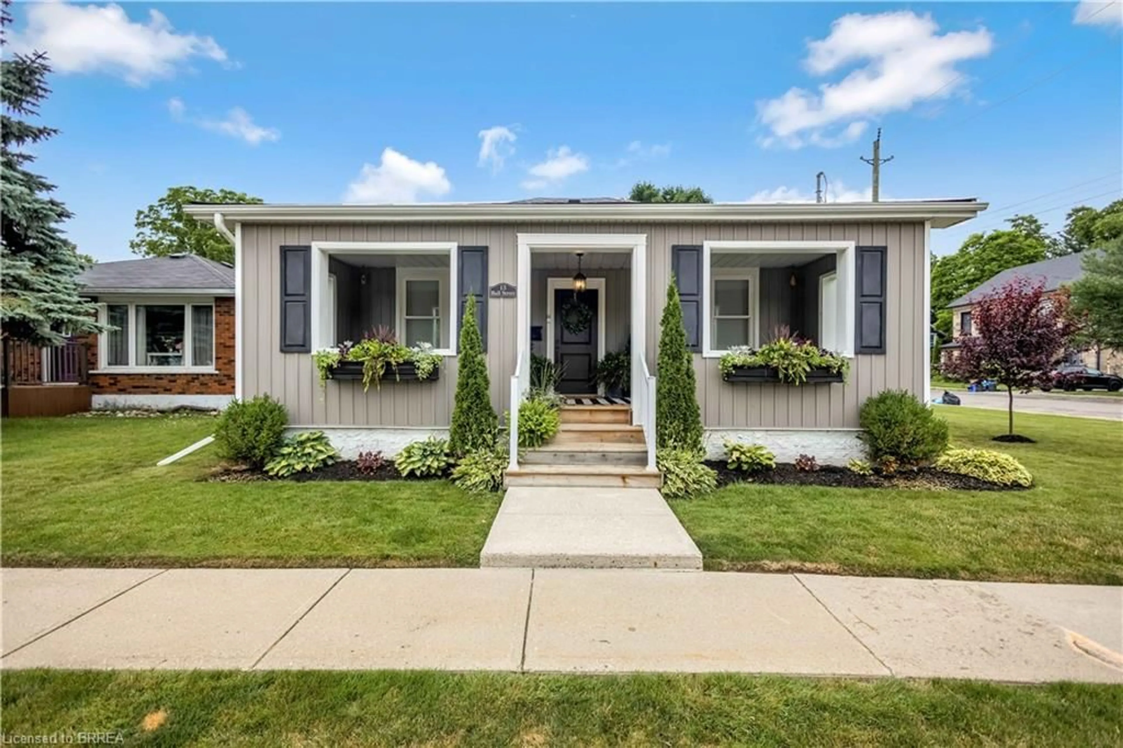 Home with vinyl exterior material, street for 13 Ball St, Paris Ontario N3L 1W8