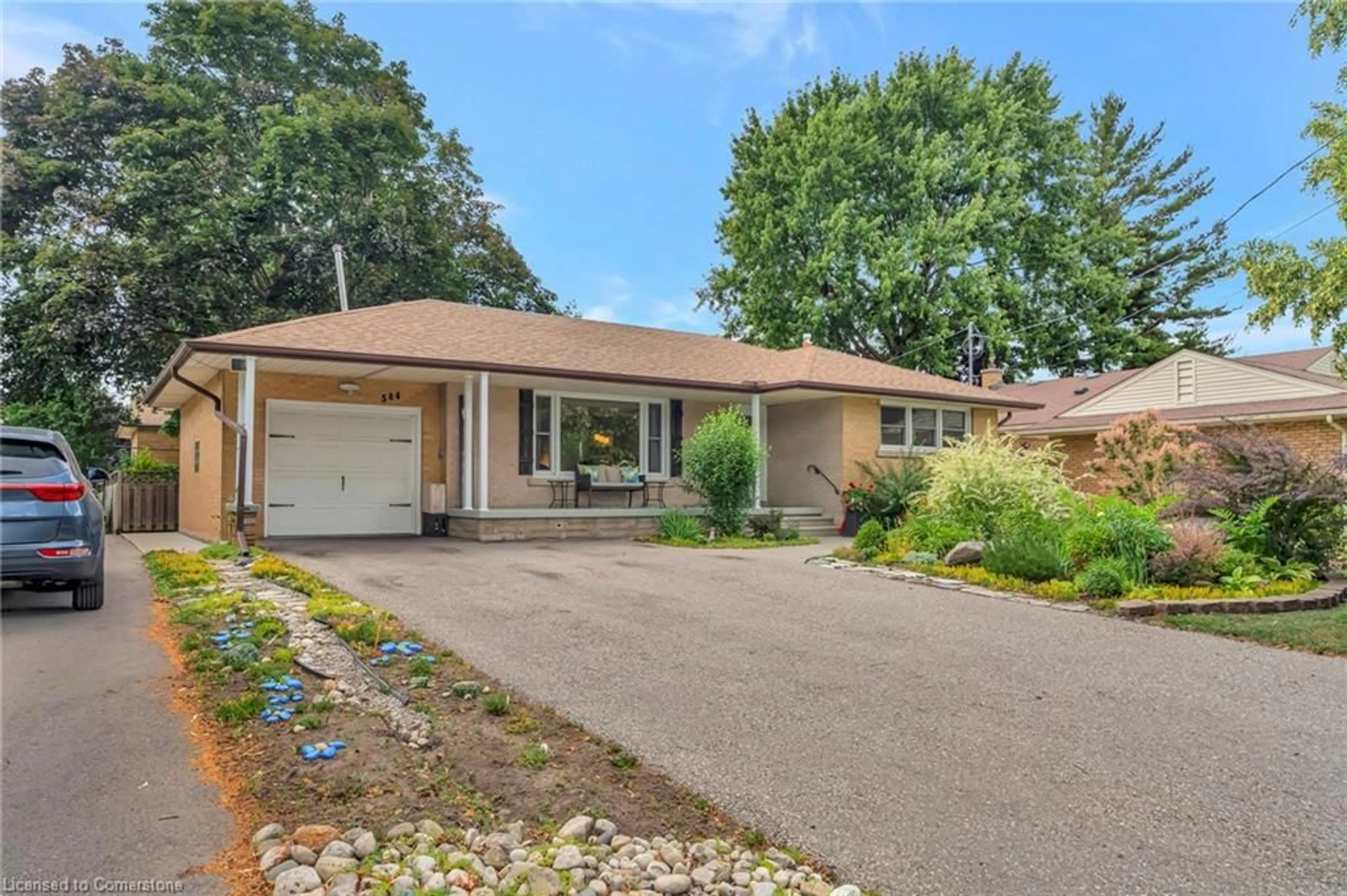 Home with brick exterior material, street for 584 Krug St, Kitchener Ontario N2B 1L7