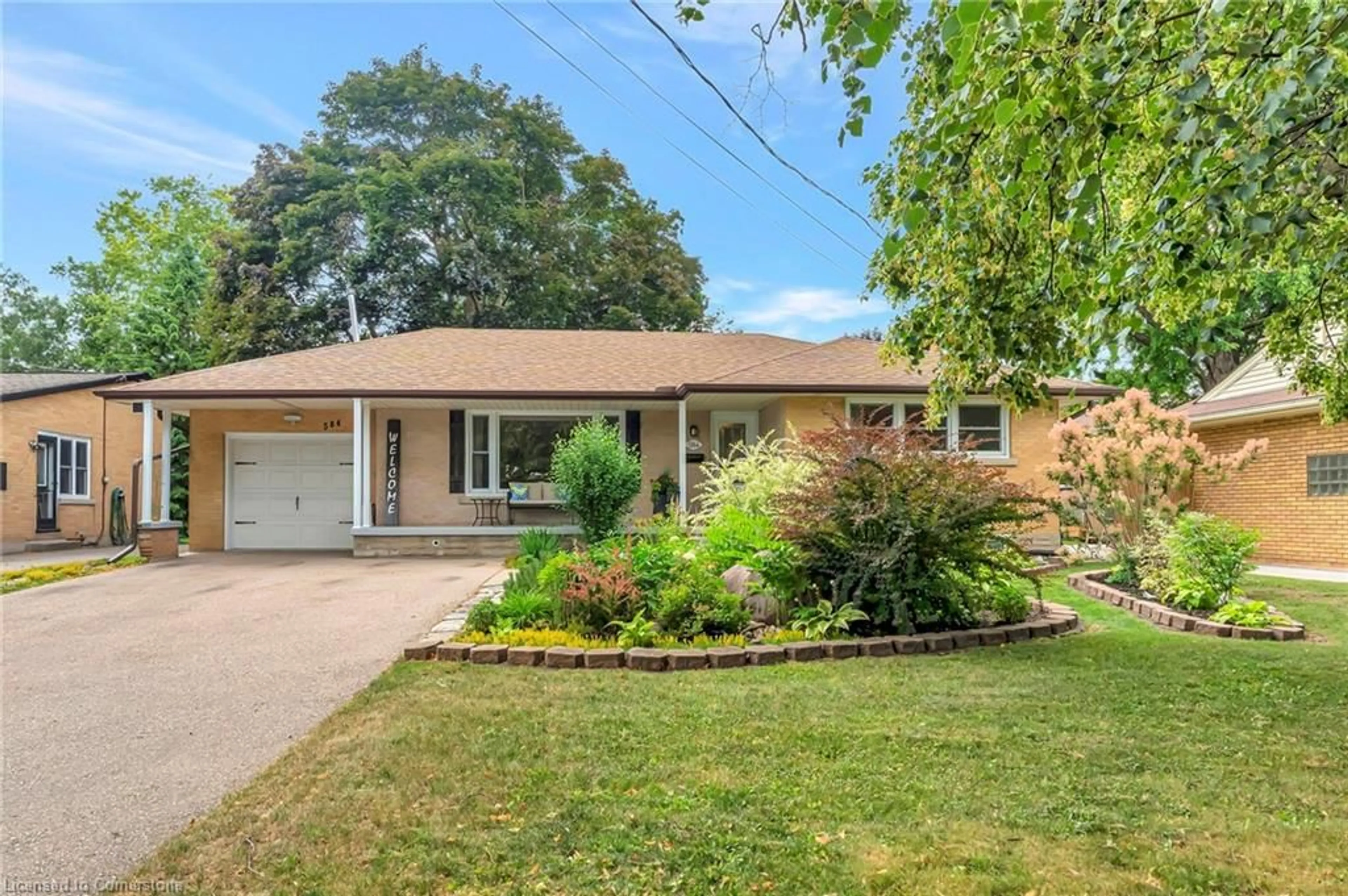 Home with brick exterior material, street for 584 Krug St, Kitchener Ontario N2B 1L7