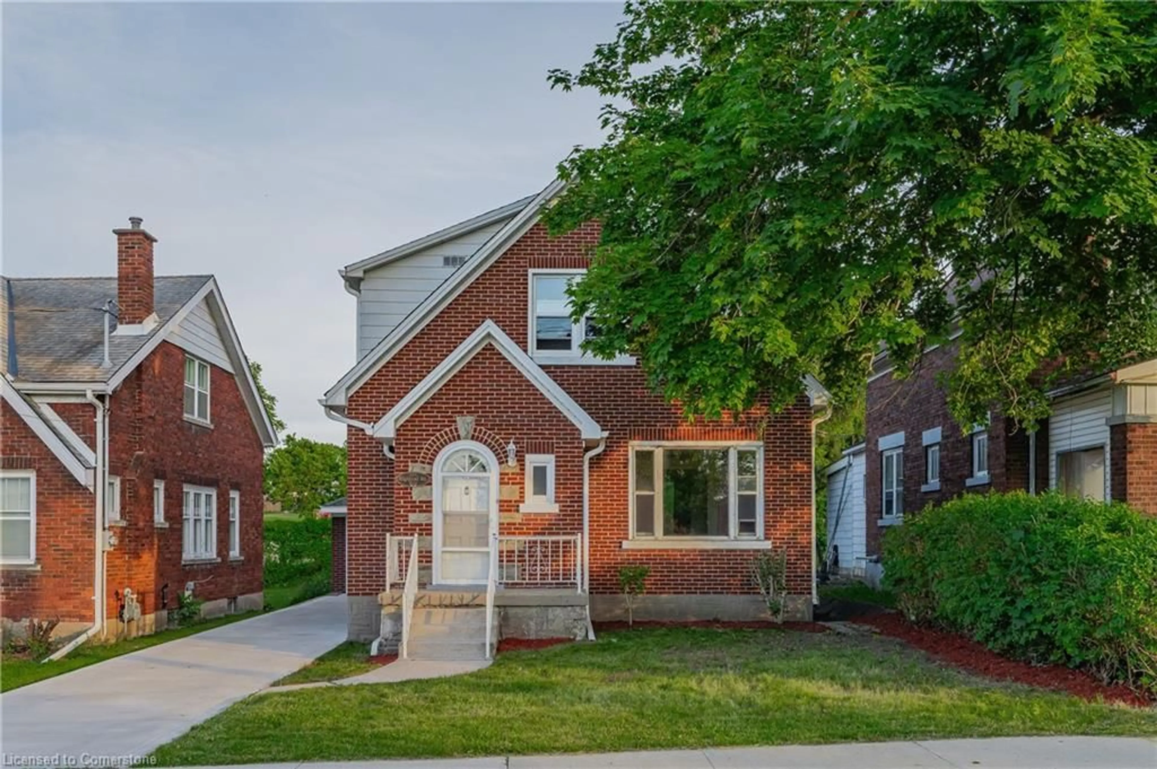 Home with brick exterior material, street for 185 Highland Rd, Kitchener Ontario N2M 3C1